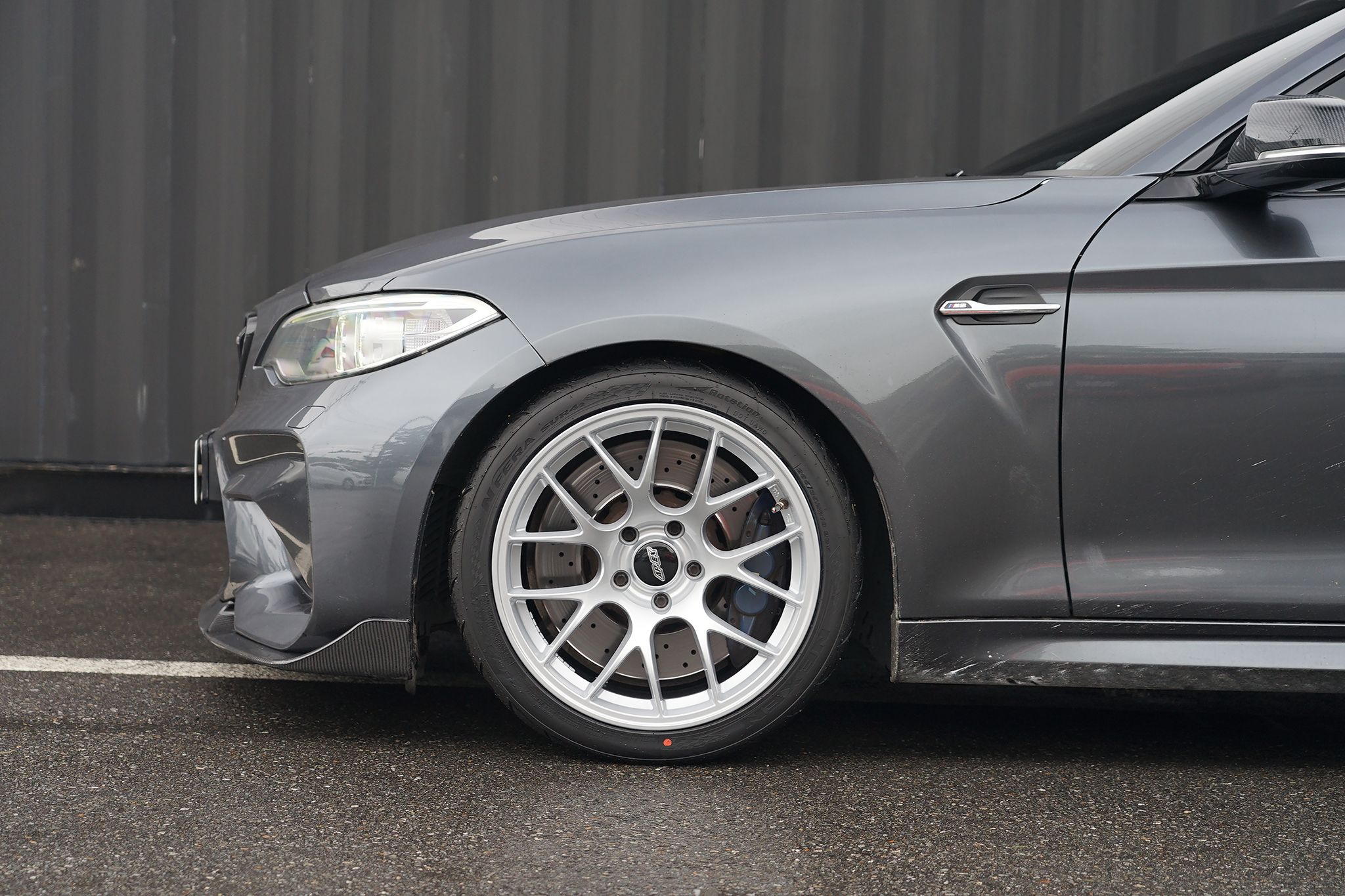 Grey BMW F87 M2 with 18" EC-7 Apex wheels in Race Silver