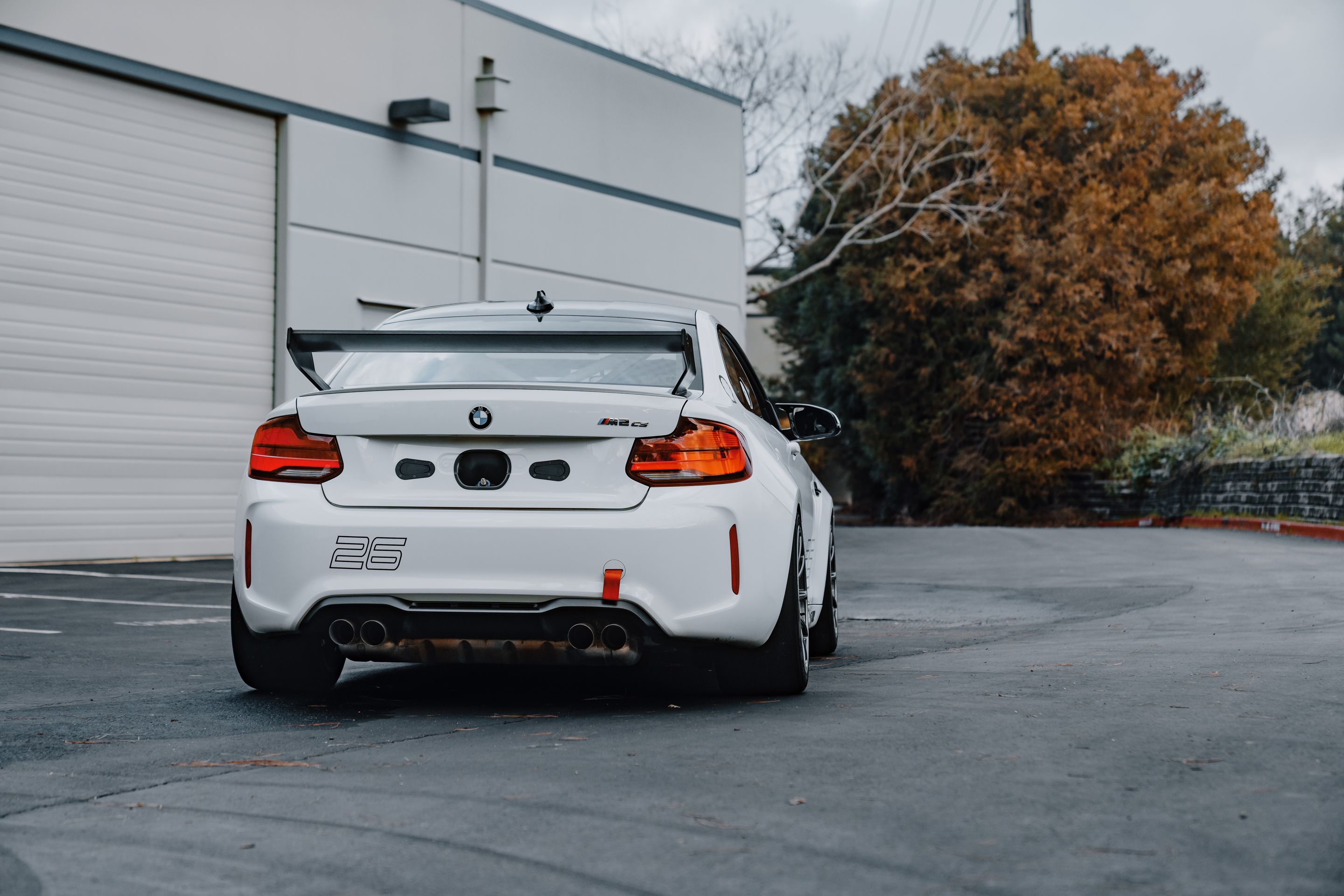 White BMW F87 M2 with 18" SM-10RE Apex wheels in Anthracite
