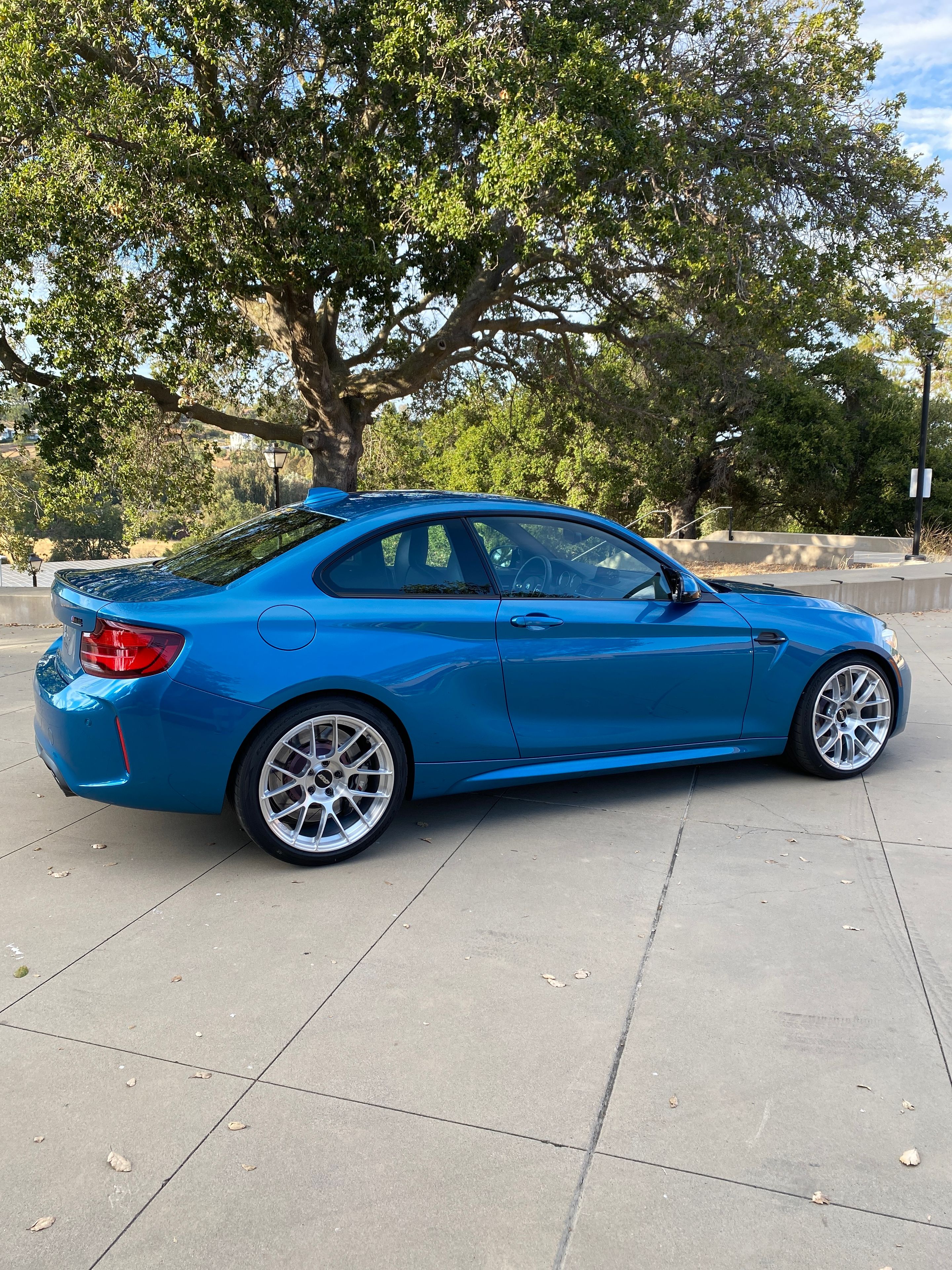 Blue BMW F87 M2 with 19" EC-7RS Apex wheels in Brushed Clear