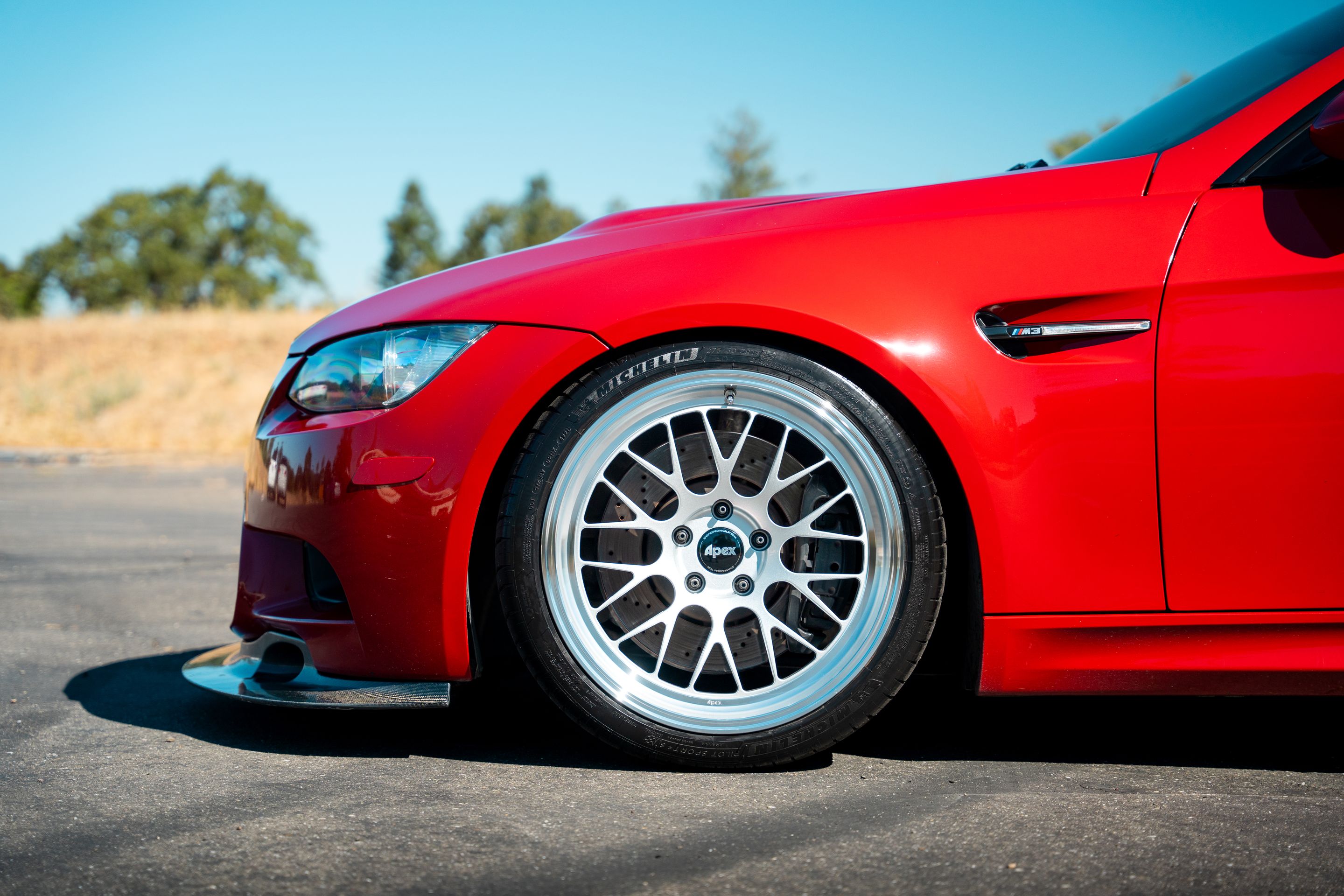 Red BMW E92 Coupe M3 with 19" ML-10RT Apex wheels in Machined Lip Race Silver