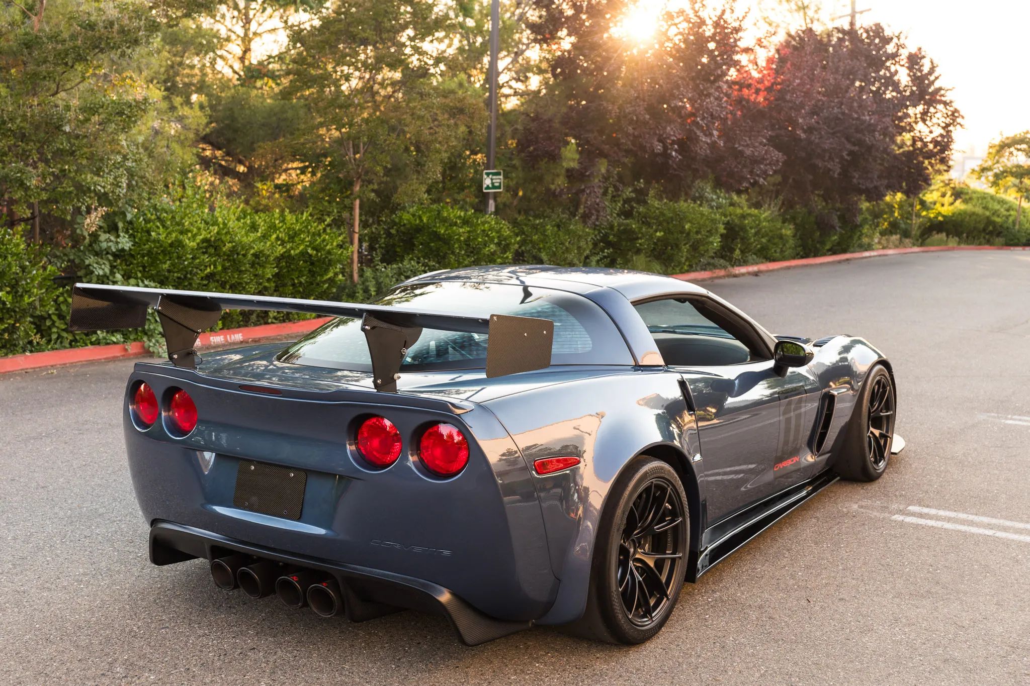Blue Chevrolet C6 Corvette Z06 with 18" VS-5RS Apex wheels in Satin Black