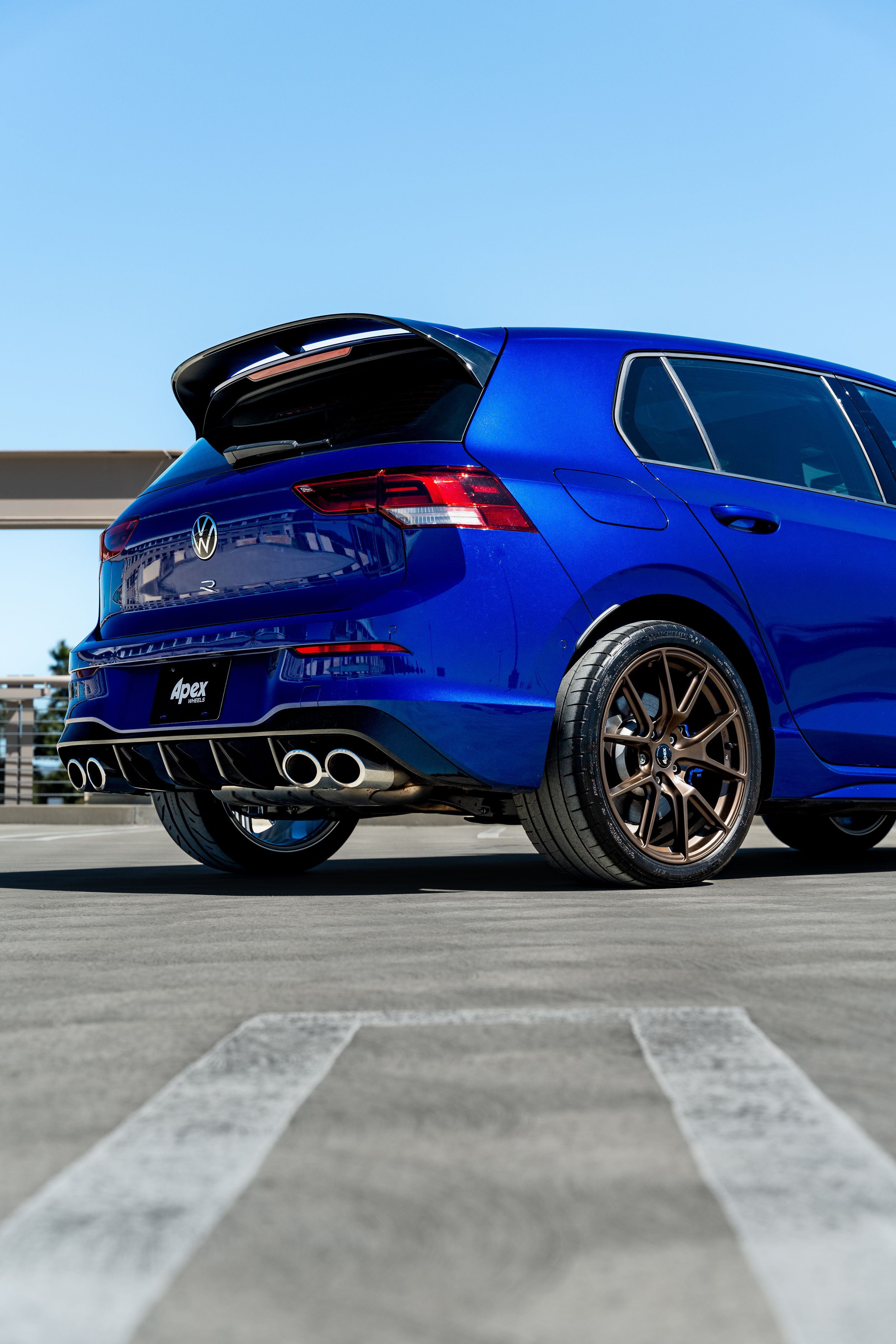 Blue VW MK8 Golf R with 18" VS-5 Apex wheels in Satin Bronze