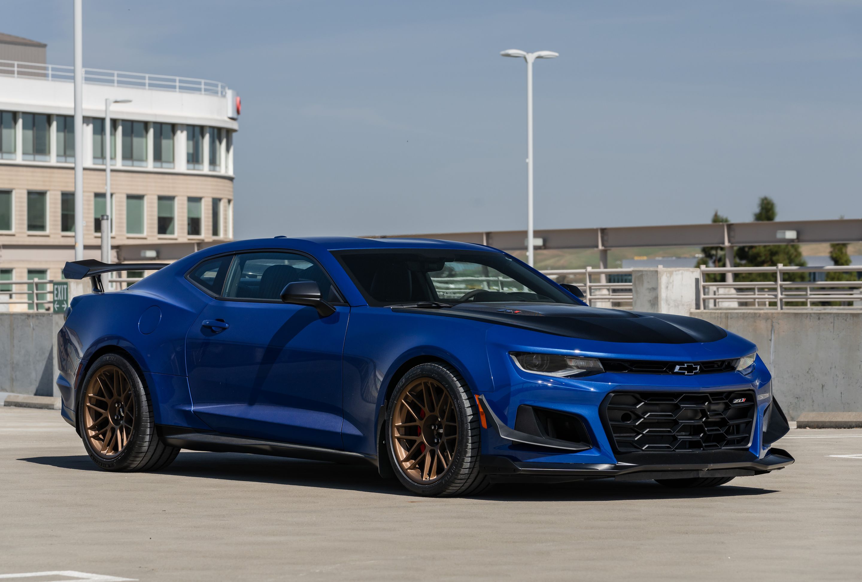 Blue Chevrolet 6th Gen Camaro ZL1 1LE with 19" ARC-8 Apex wheels in Satin Bronze