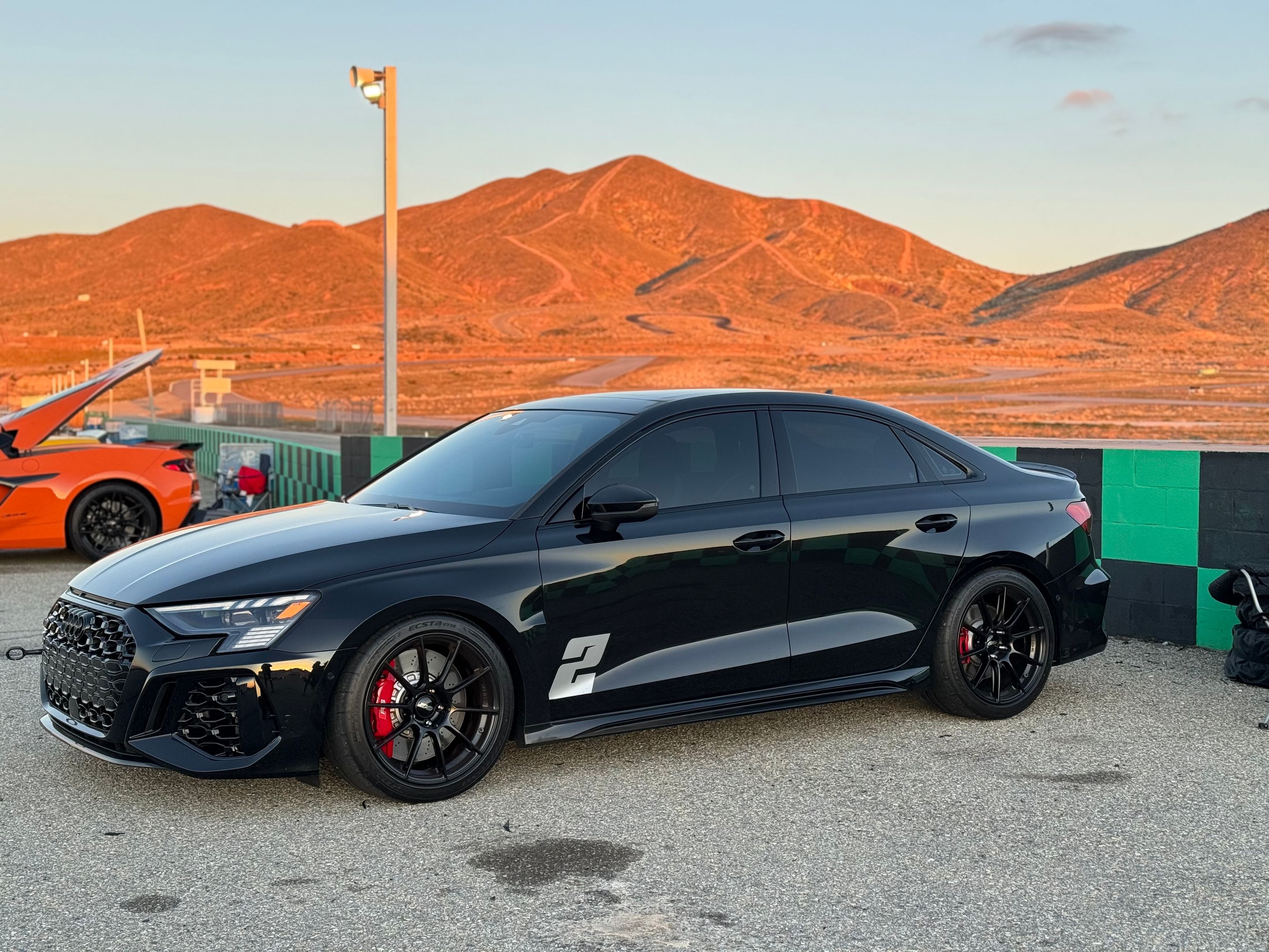 Black Audi 8Y RS 3 with 18" SM-10RS Apex wheels in Satin Black