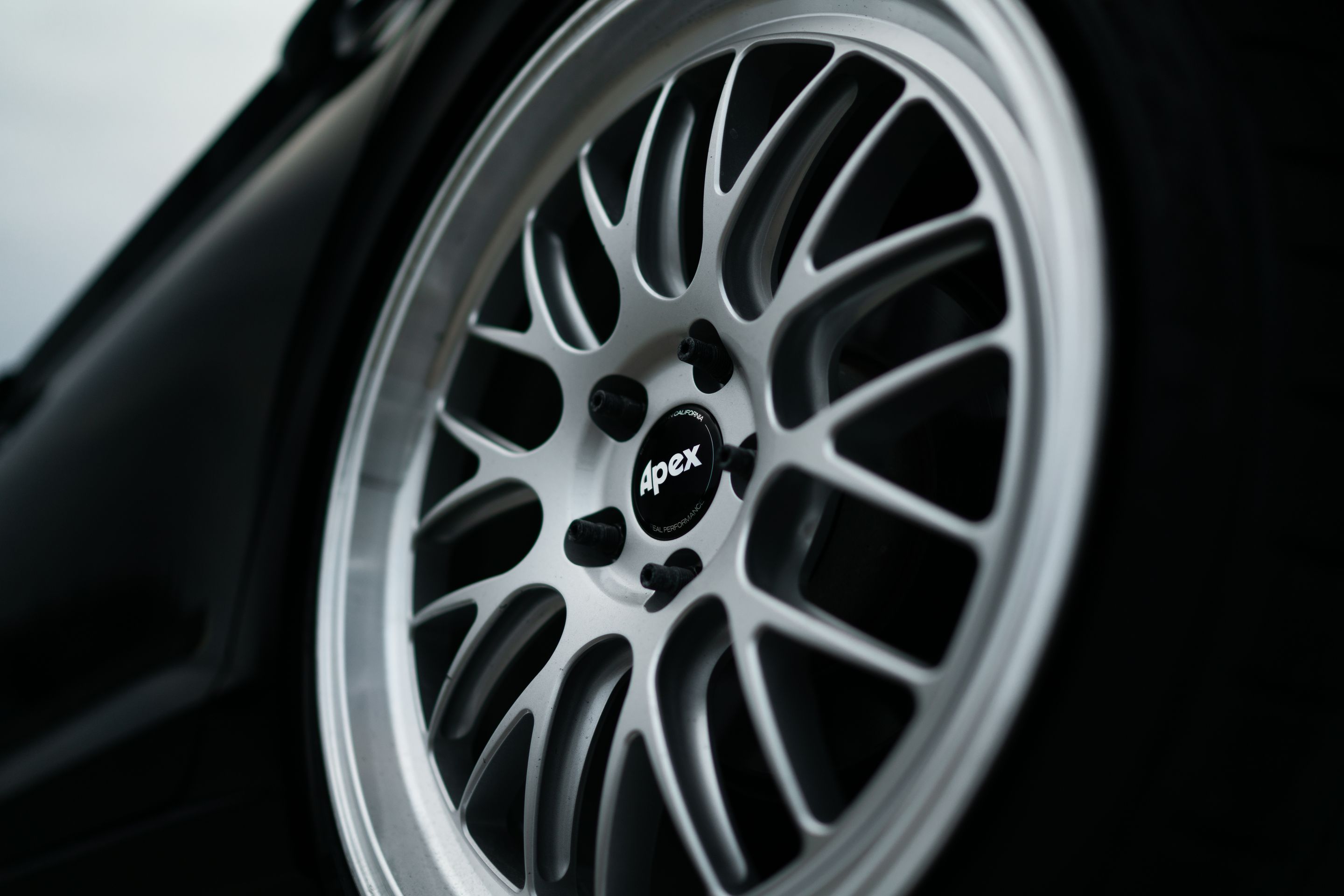 Black VW MK7 Jetta with 19" ML-10RT Apex wheels in Machined Lip Race Silver