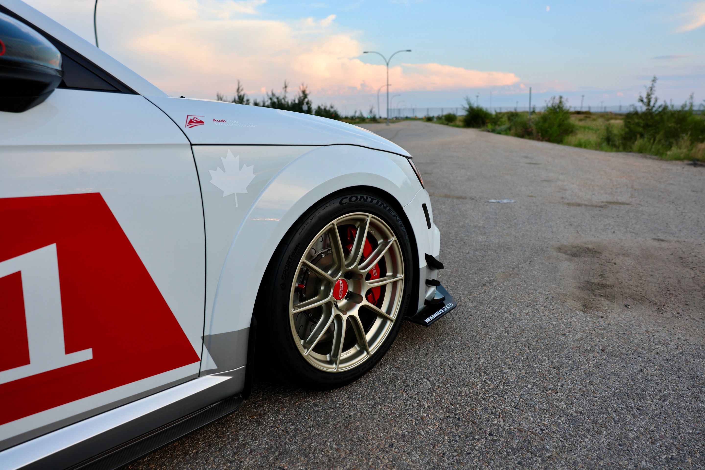 White Audi FV/8S TT RS with 18" SM-10RS Apex wheels in Motorsport Gold