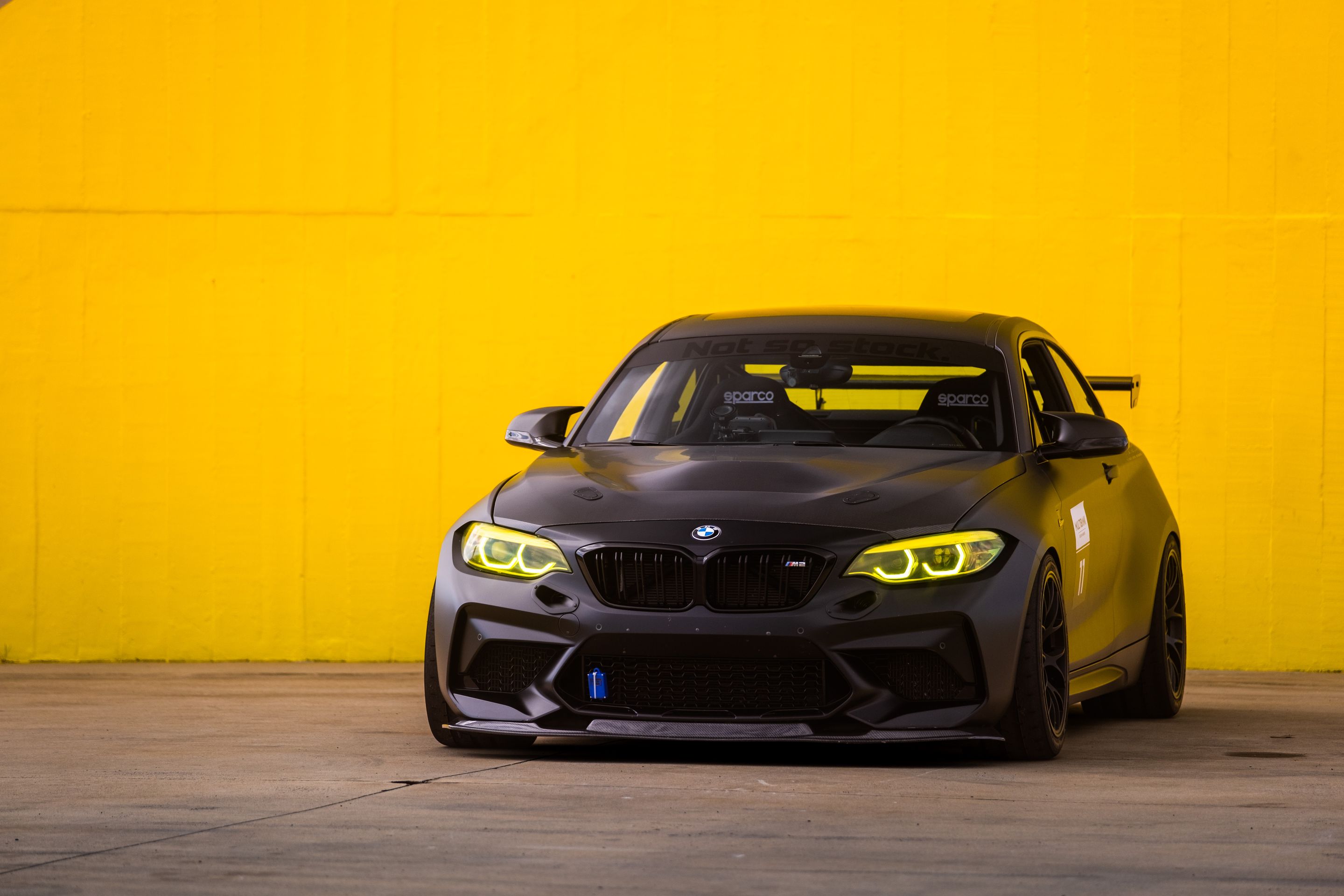 Black BMW F87 M2 with 18" EC-7 Apex wheels in Satin Black