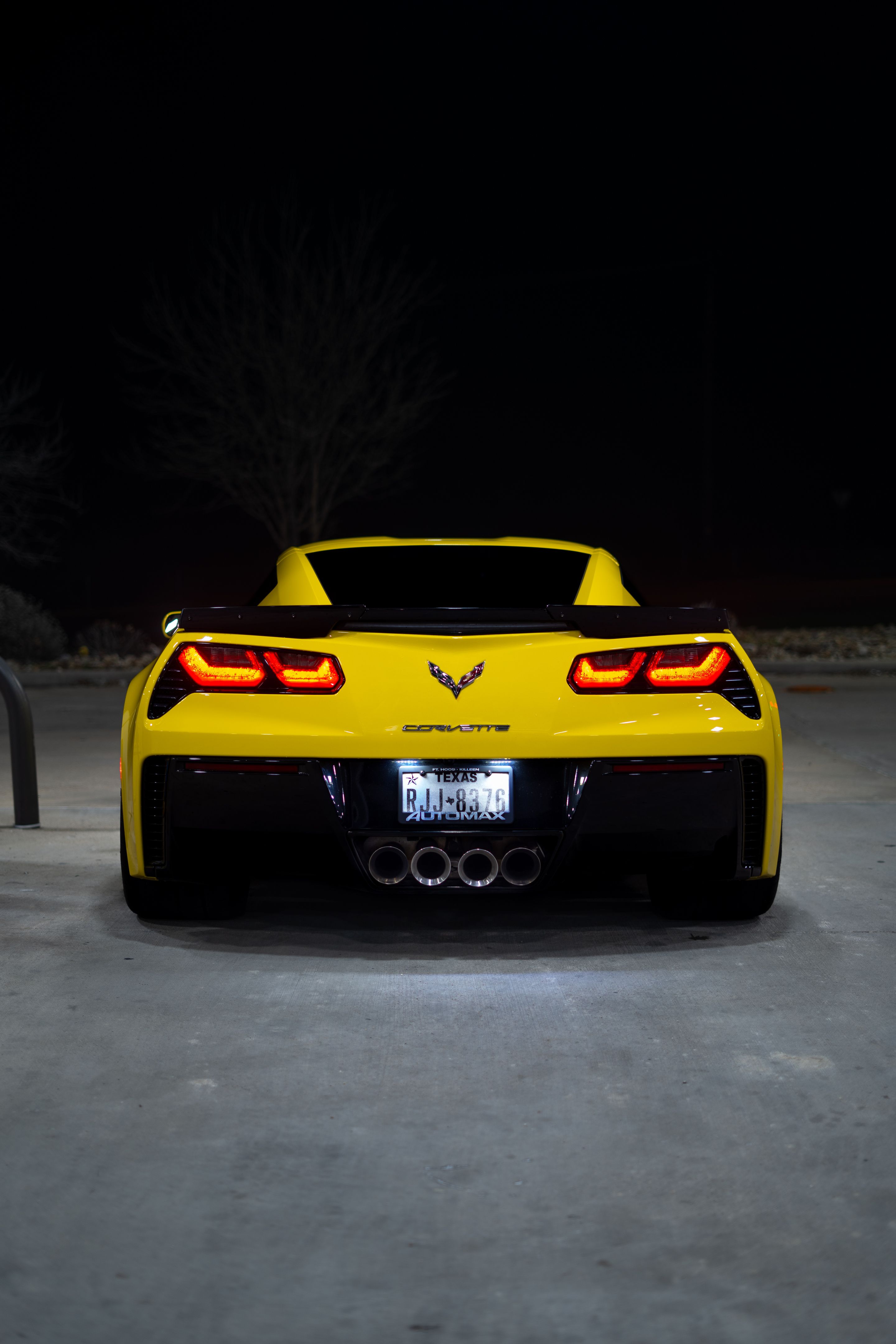 Yellow Chevrolet C7 Corvette Grand Sport with 19" SM-10 Apex wheels in Satin Black