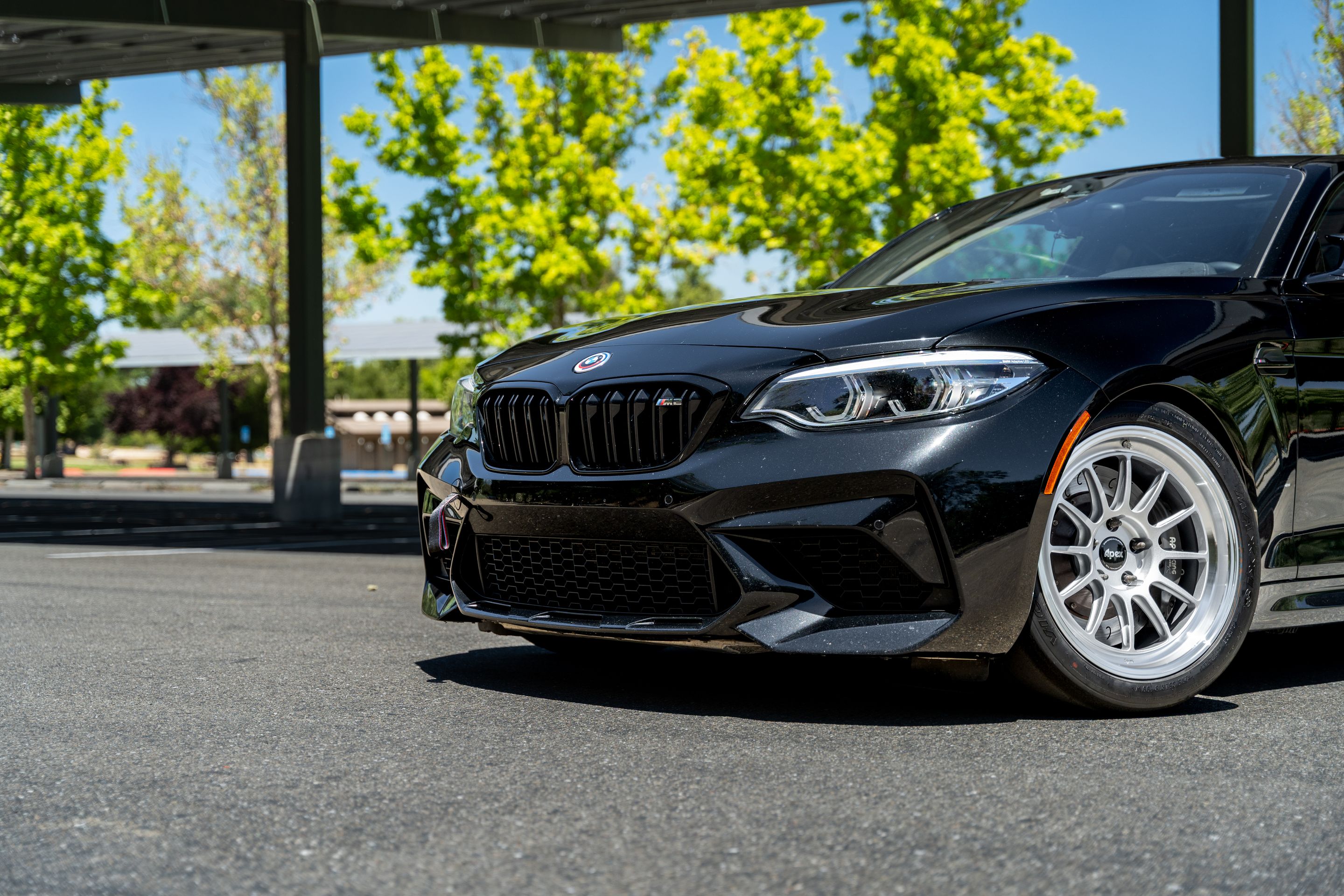 Black BMW F87 M2 with 18" SL-12RT Apex wheels in Machined Lip Race Silver