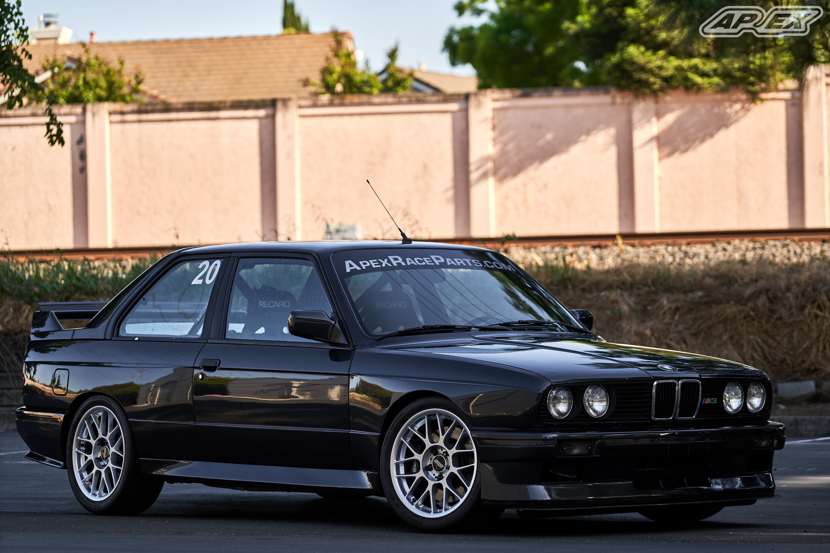 Black BMW E30 M3 with 17" ARC-8 Apex wheels in Hyper Silver
