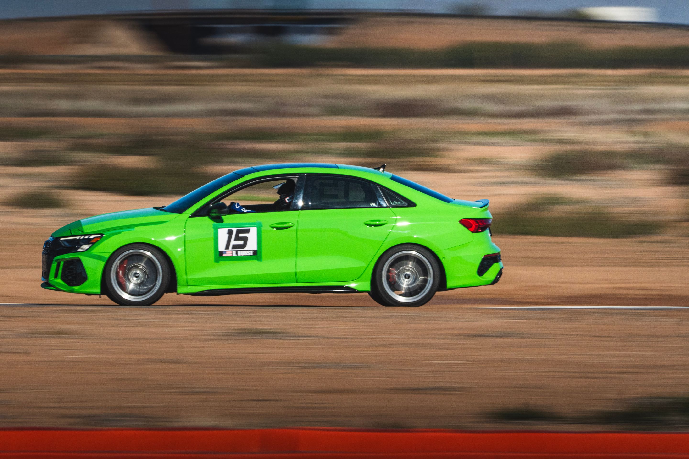 Green Audi 8Y RS 3 with 18" VS-5RS Apex wheels in Brushed Clear