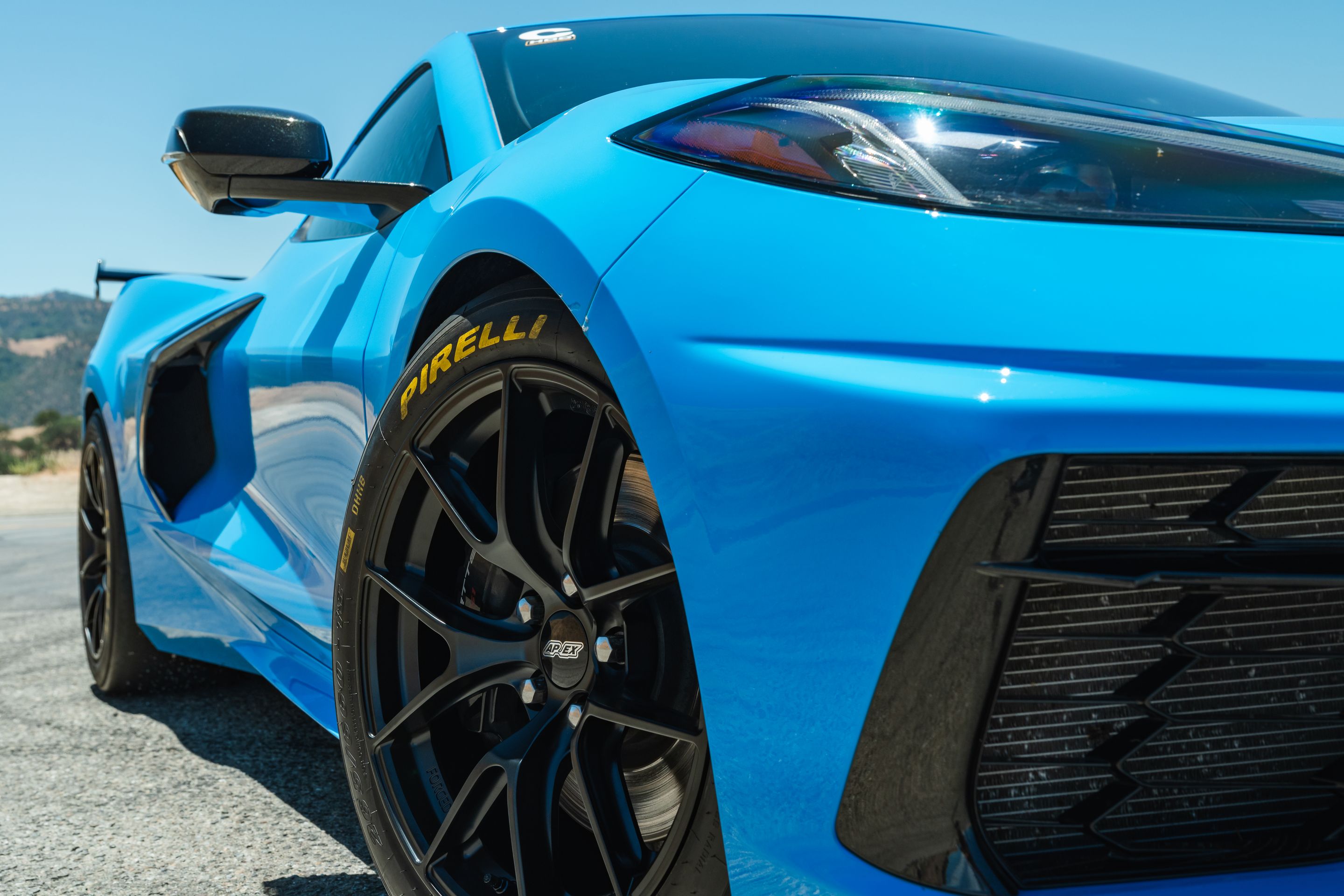 Blue Chevrolet C8 Corvette Stingray/Z51 with 18" VS-5RS Apex wheels in Satin Black