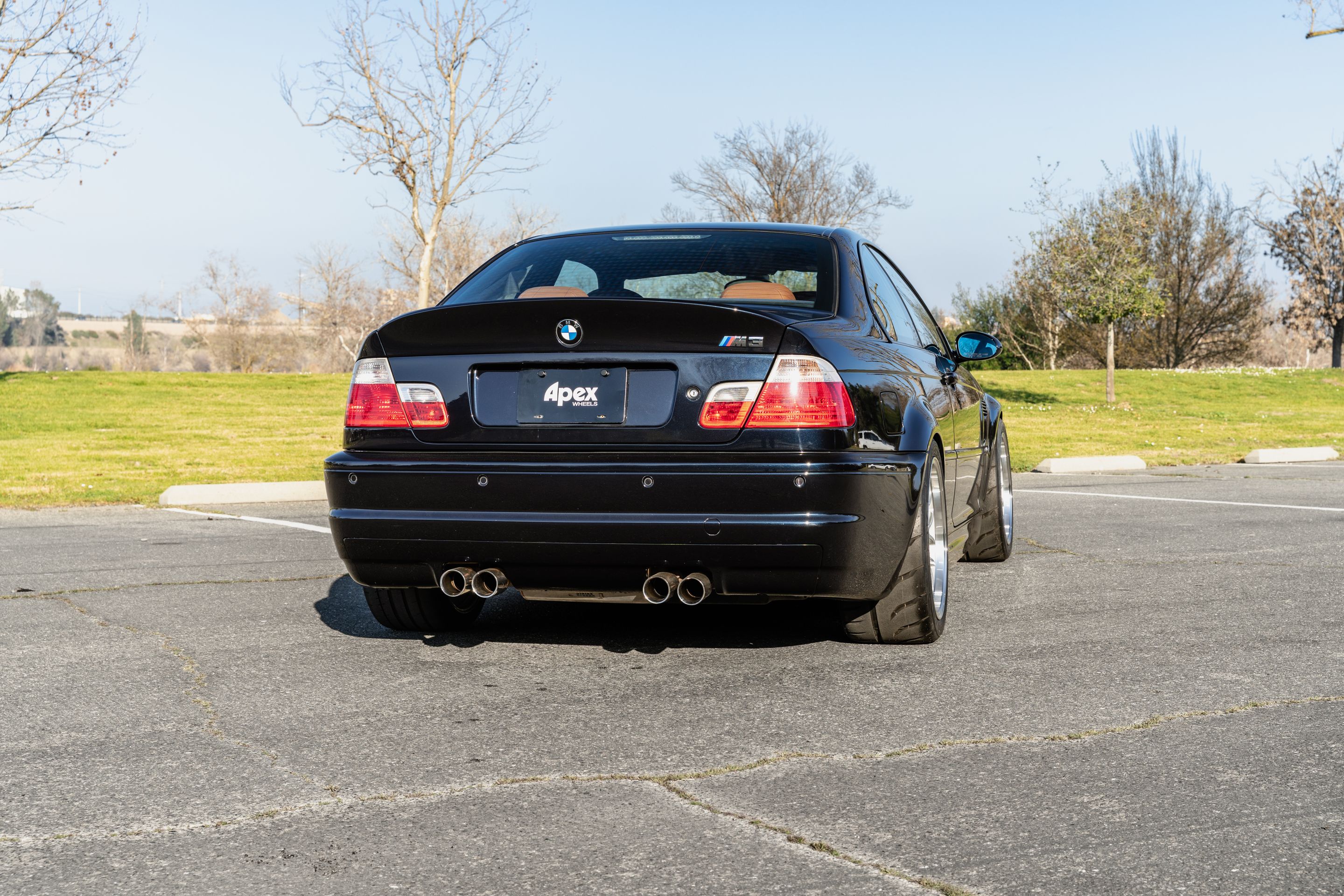 Black BMW E46 M3 with 18" ML-7RT Apex wheels in Machined Lip Race Silver