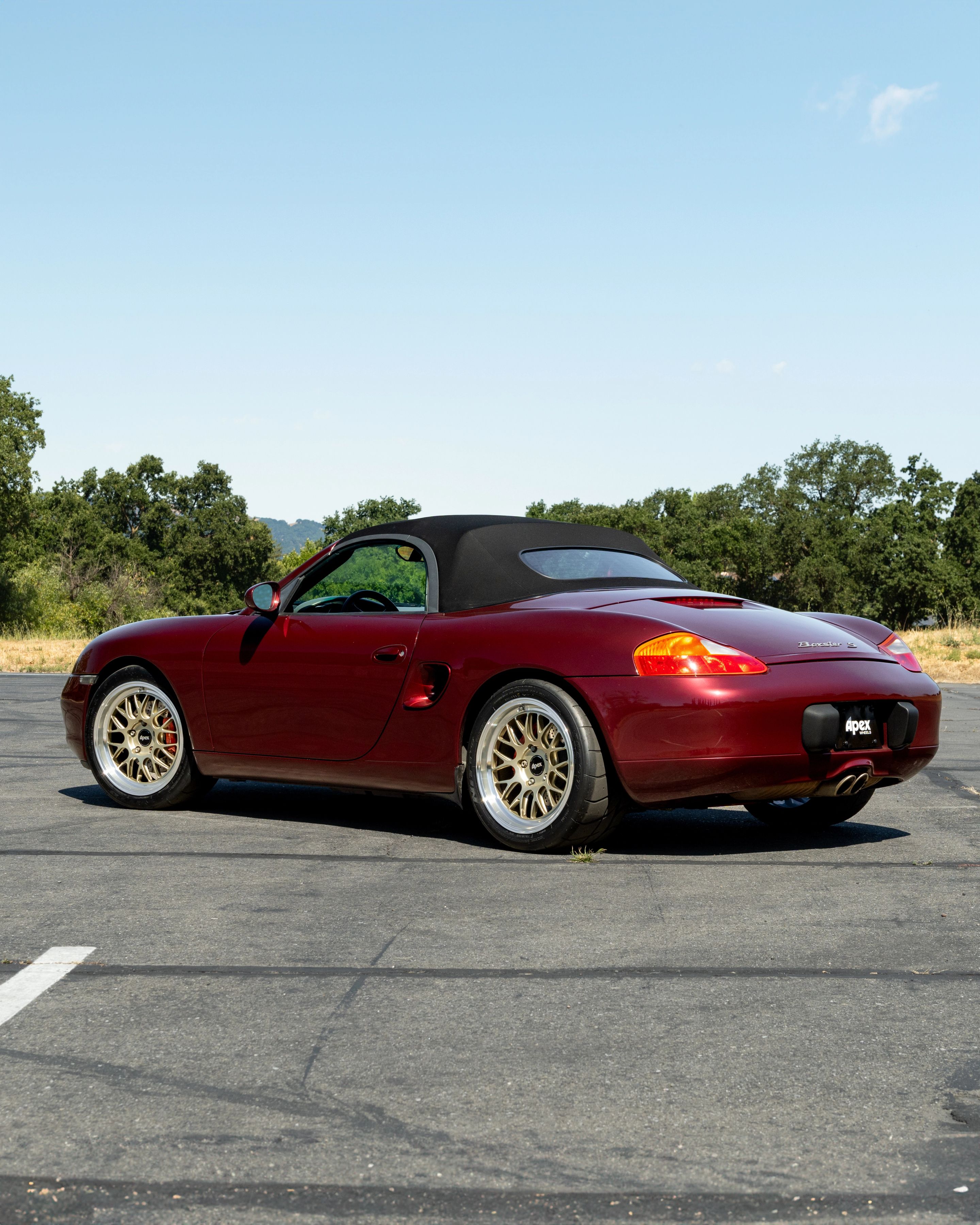 Red Porsche 986 Boxster with 18" ML-10RT Apex wheels in Machined Lip Gloss Motorsport Gold