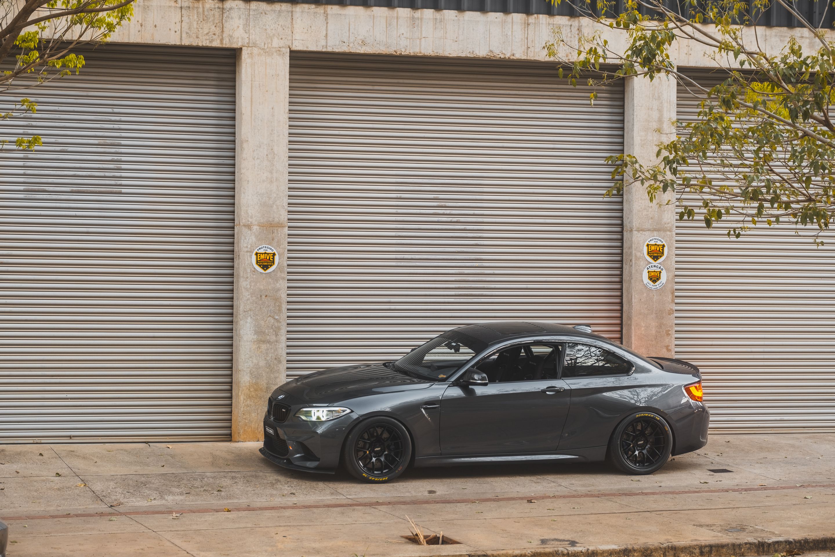 Black BMW F87 M2 with 18" EC-7 Apex wheels in Satin Black