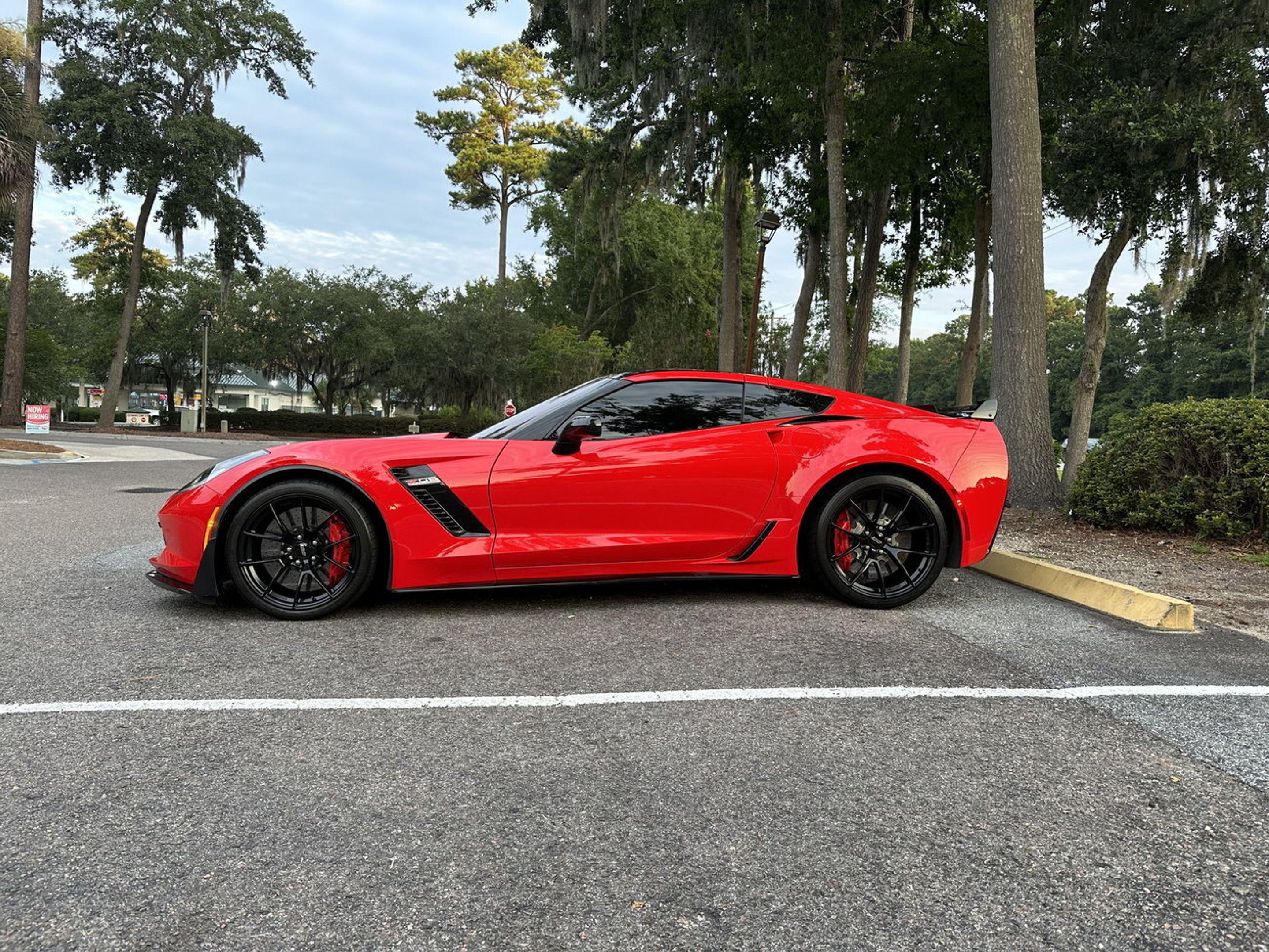Red Chevrolet C7 Corvette Z06 with 19"/20" VS-5RS Apex wheels in Satin Black