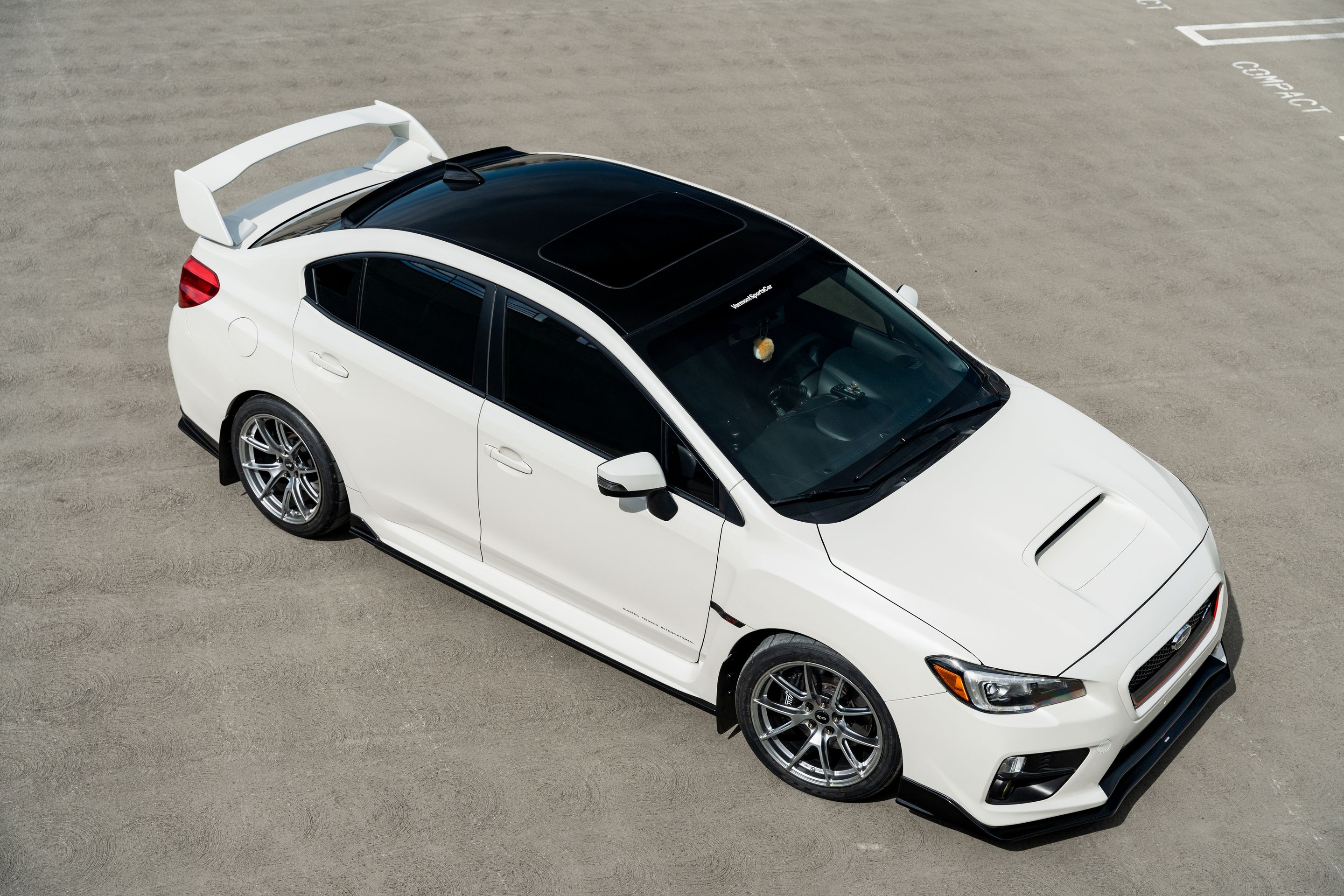 White Subaru VA WRX STI with 18" VS-5 Apex wheels in Hyper Black