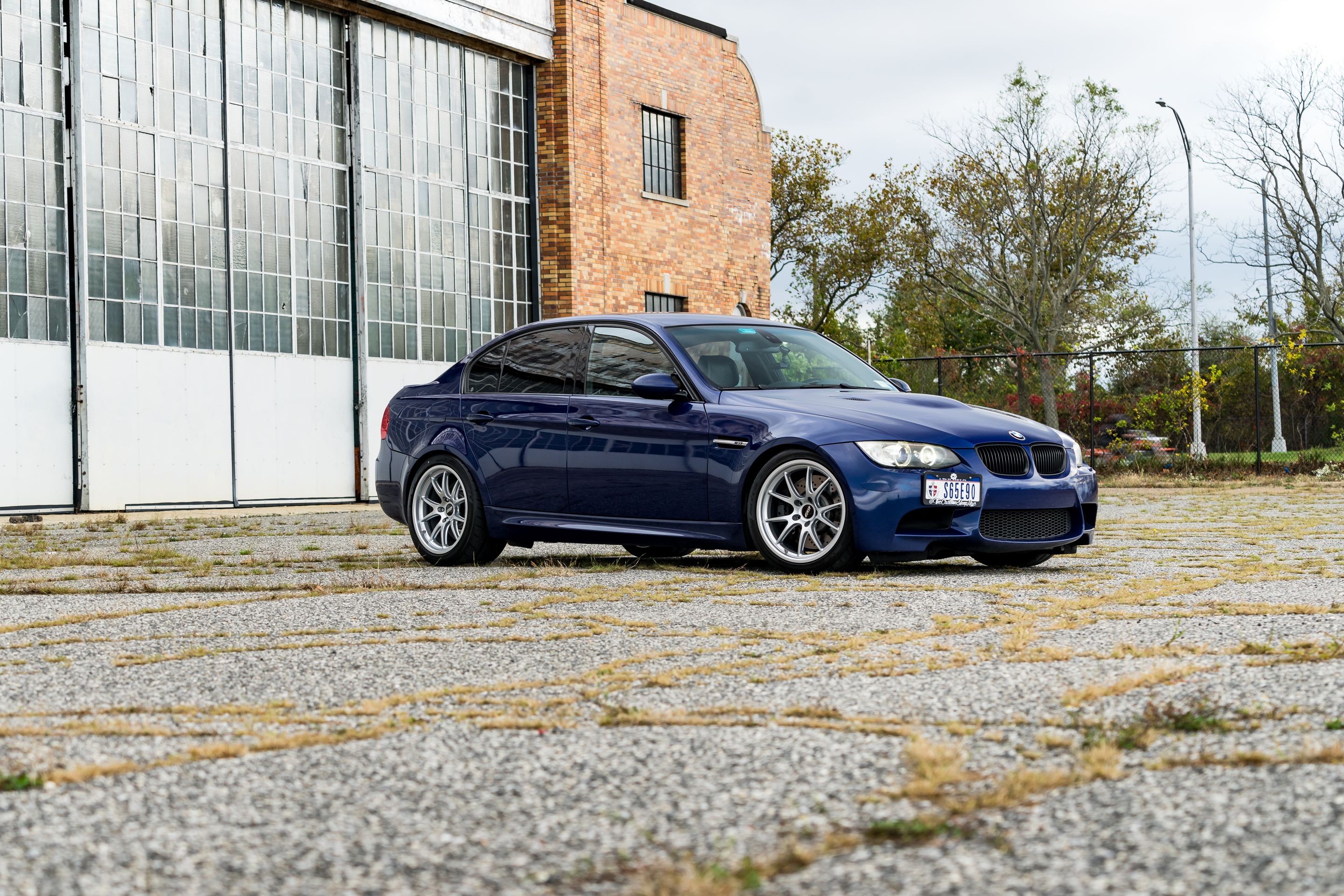 Blue BMW E90 Sedan M3 with 18" FL-5 Apex wheels in Race Silver