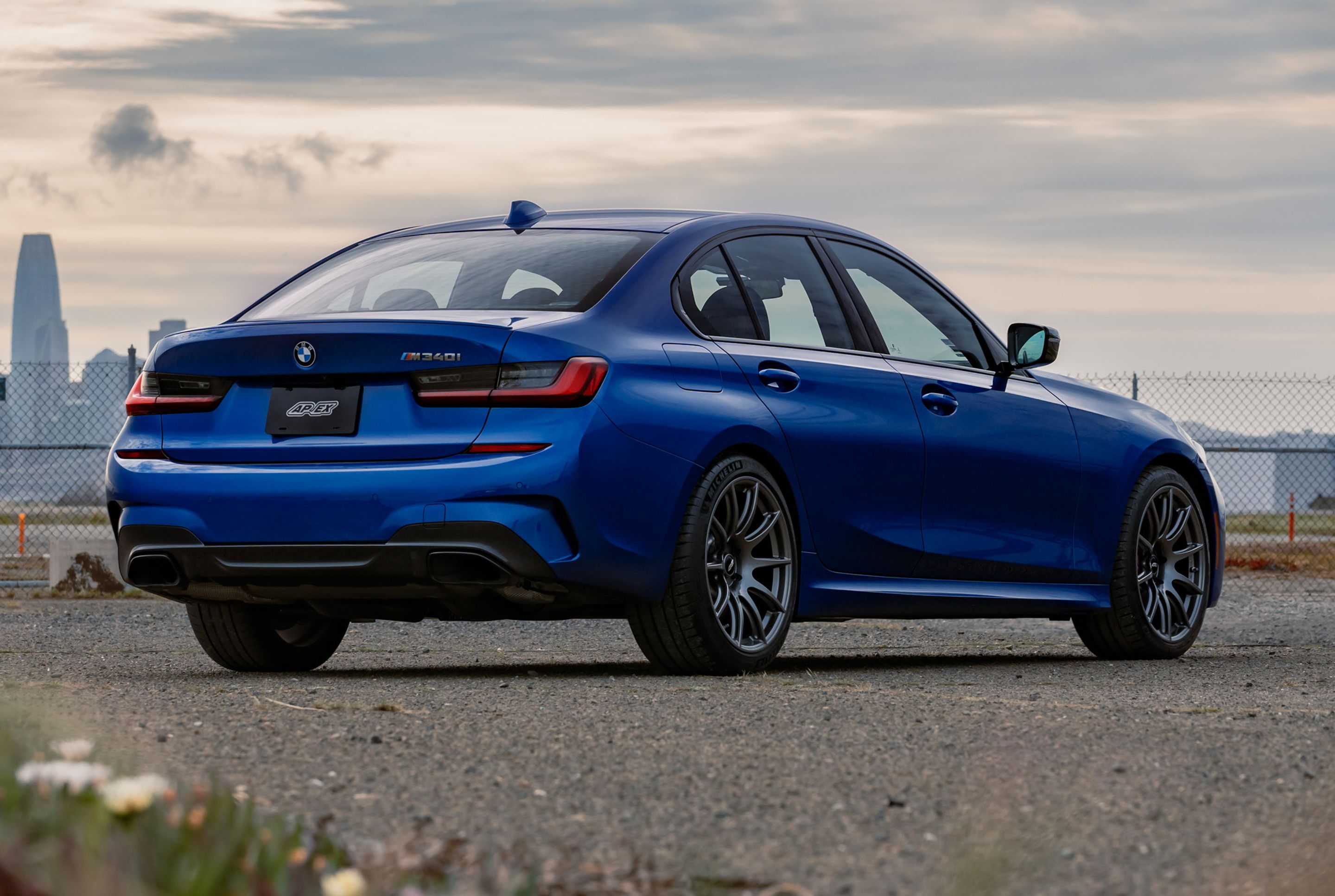 Blue BMW G20 Sedan 3 Series with 19" SM-10 Apex wheels in Anthracite