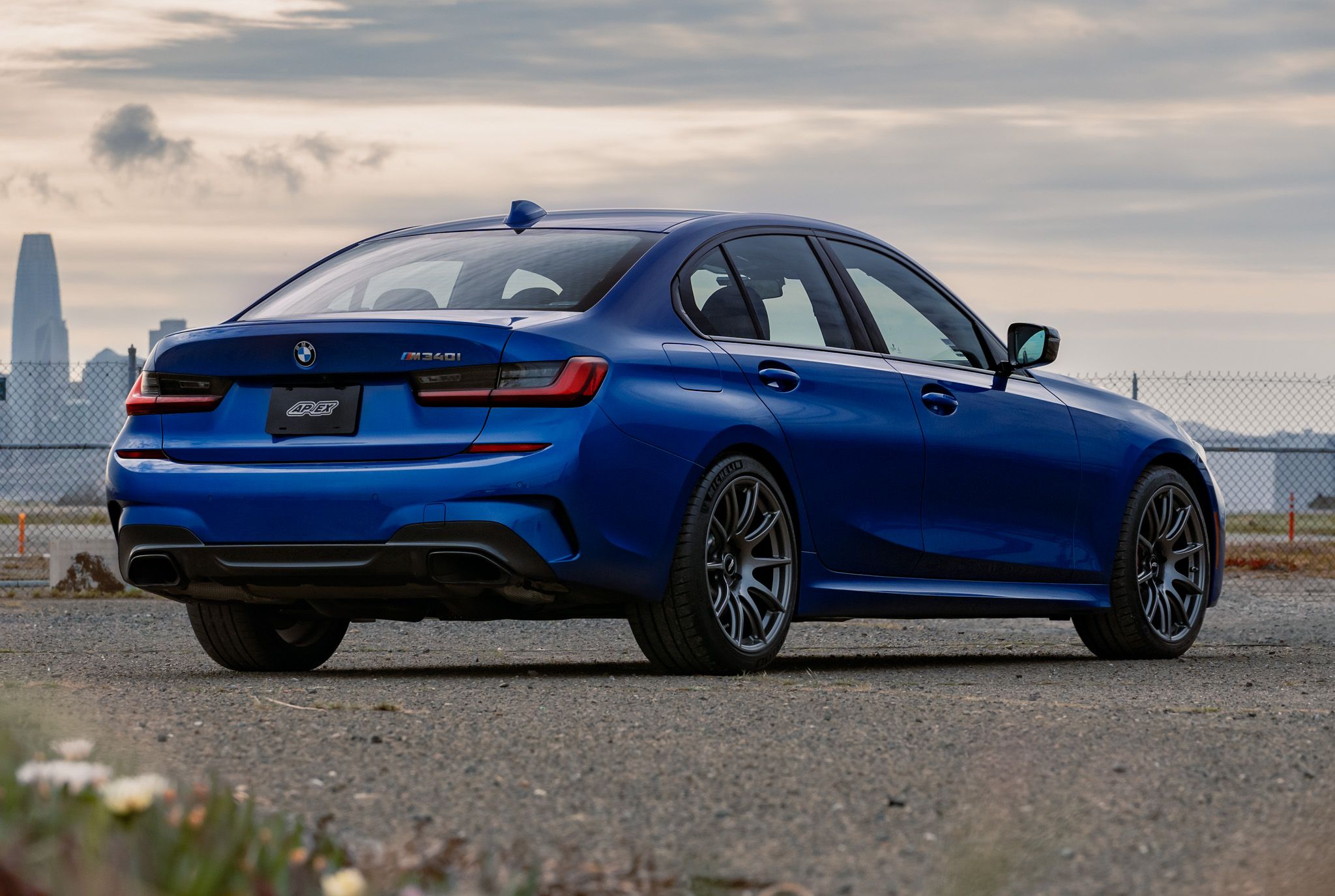 Blue BMW G20 Sedan 3 Series with 19" SM-10 Apex wheels in Anthracite