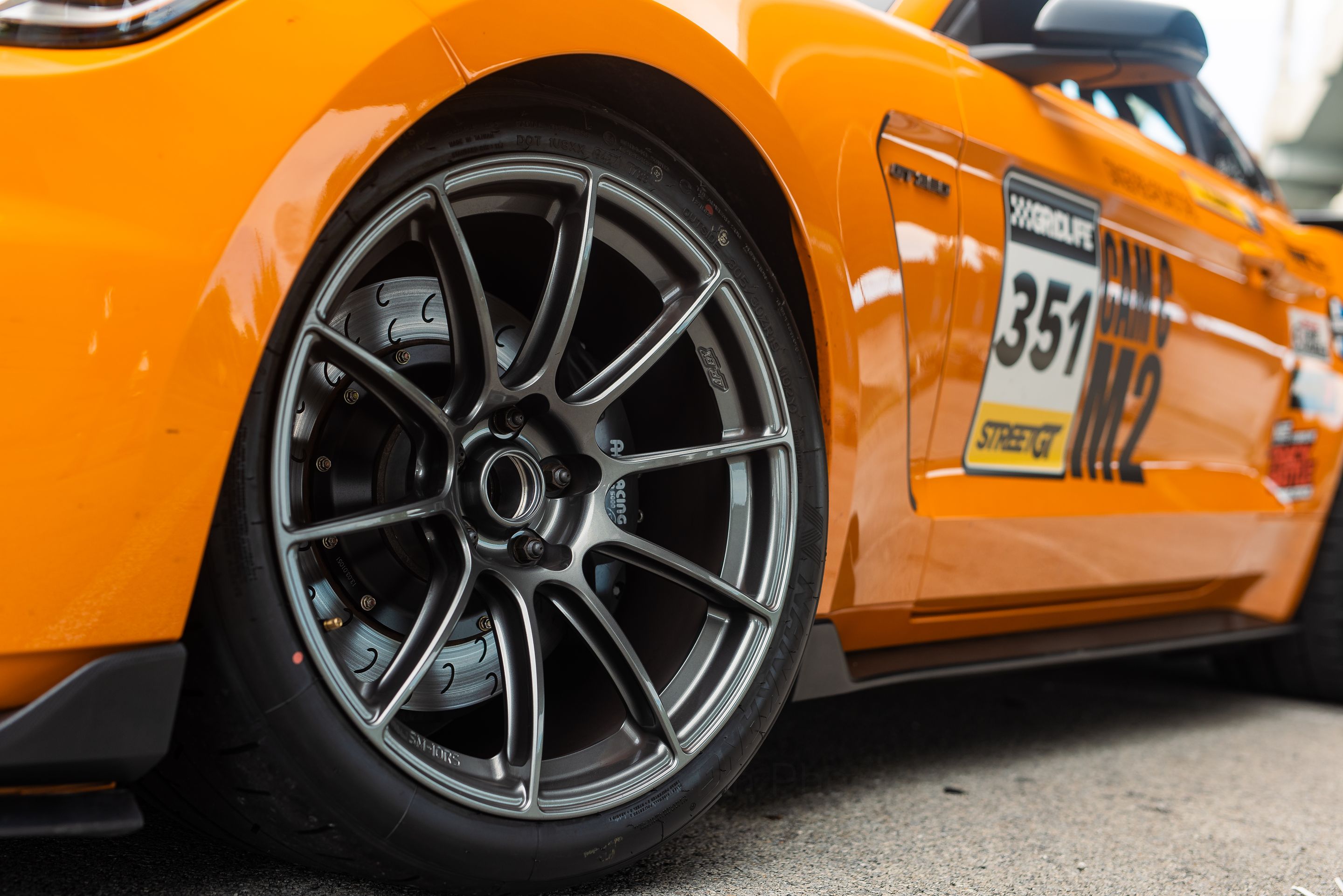 Orange Ford S550 Mustang GT350 with 19" SM-10RS Apex wheels in Anthracite
