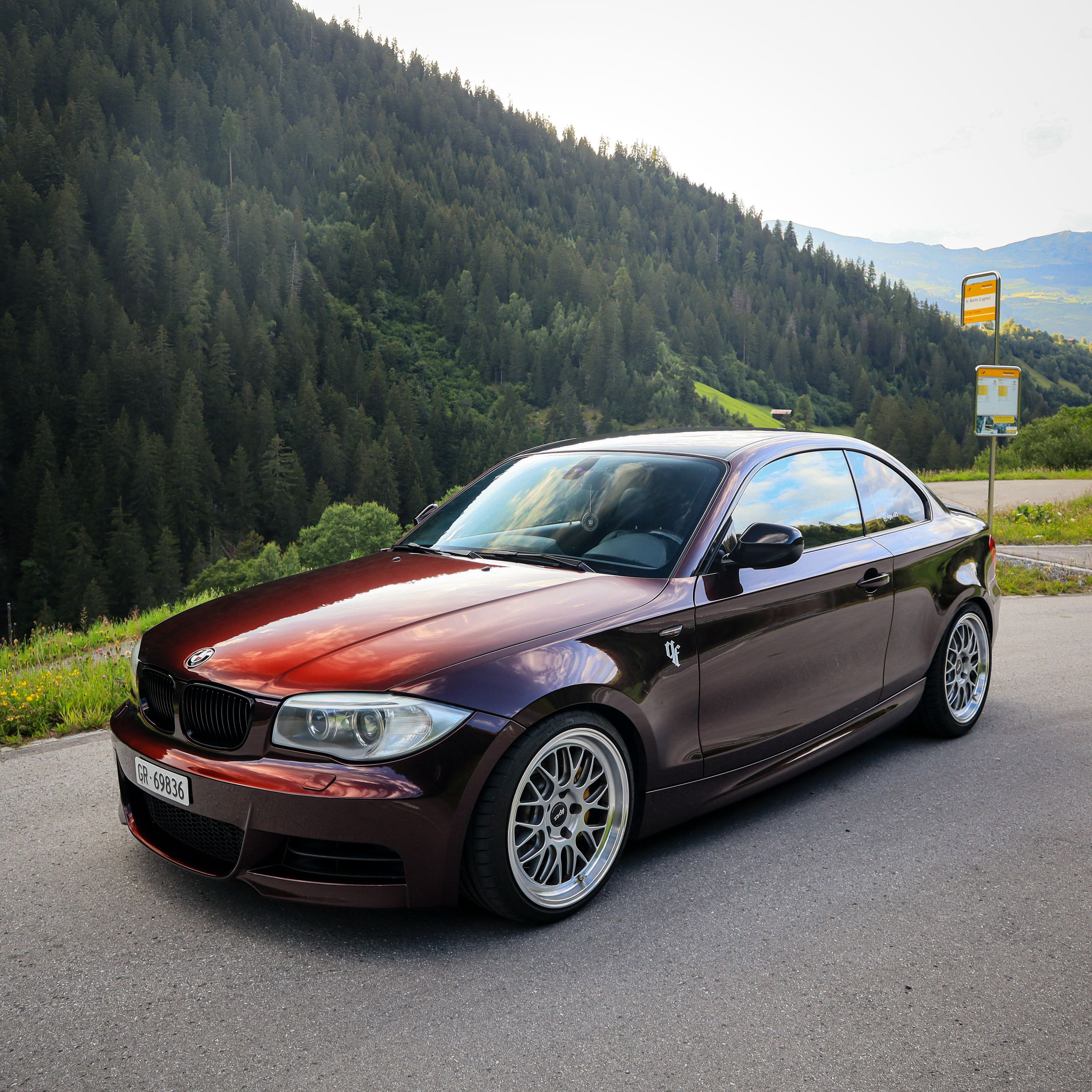 Red BMW E82 Coupe 1 Series with 18" ML-10RT Apex wheels in Machined Lip Race Silver