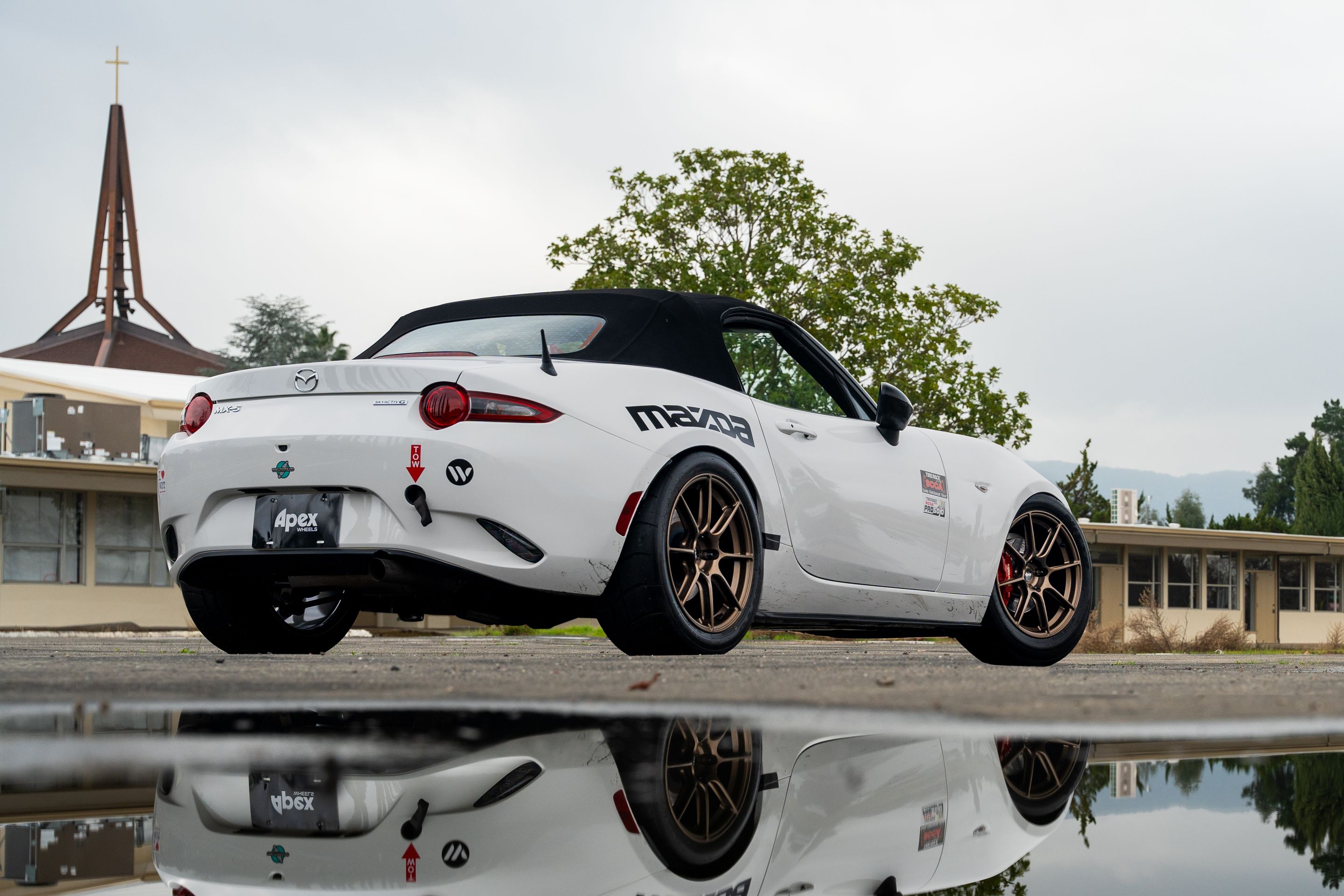 White Mazda ND MX-5 Miata with 17" SM-8RS Apex wheels in Satin Bronze
