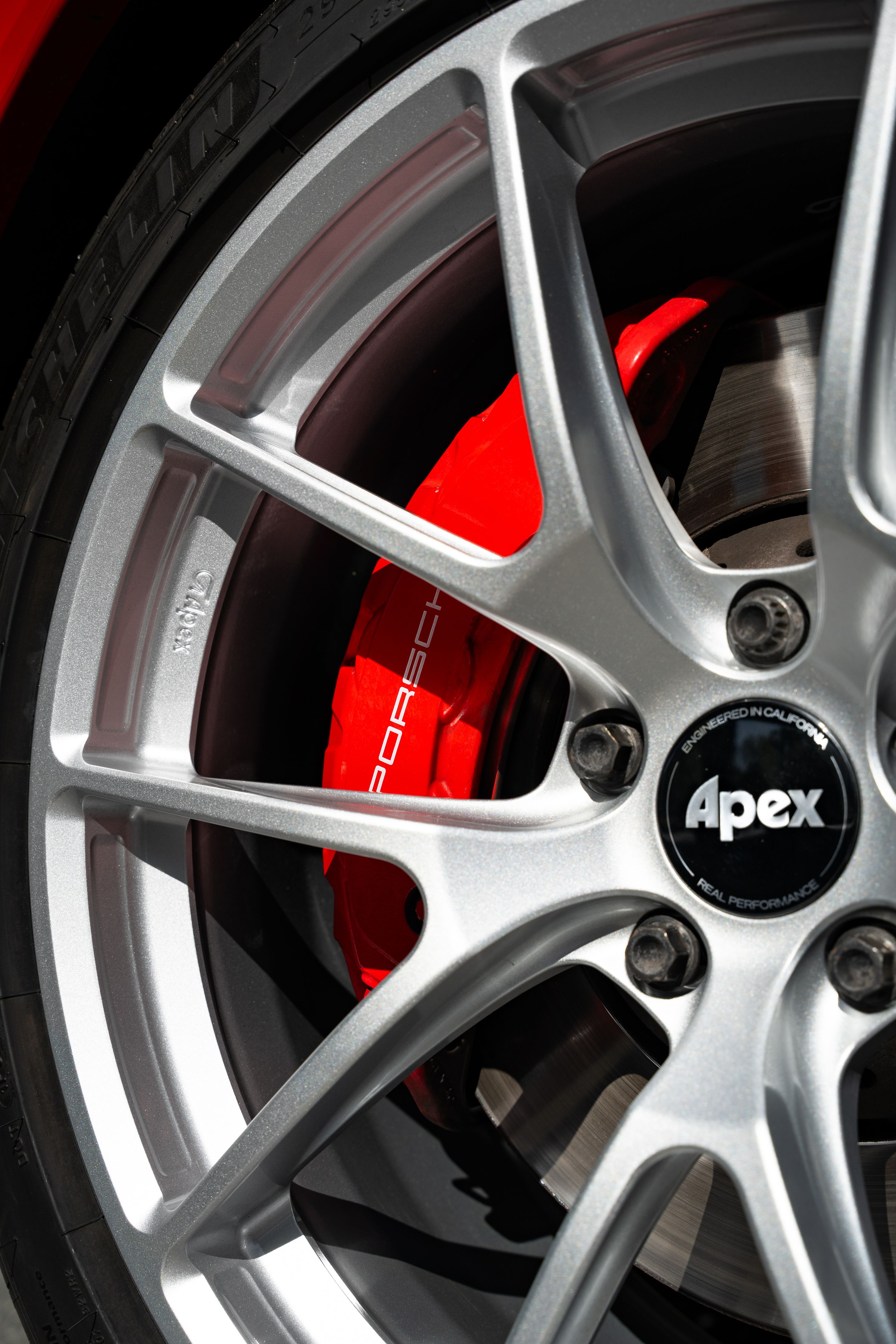 Red Porsche 958 Cayenne with 21" VS-5RX Apex wheels in Race Silver