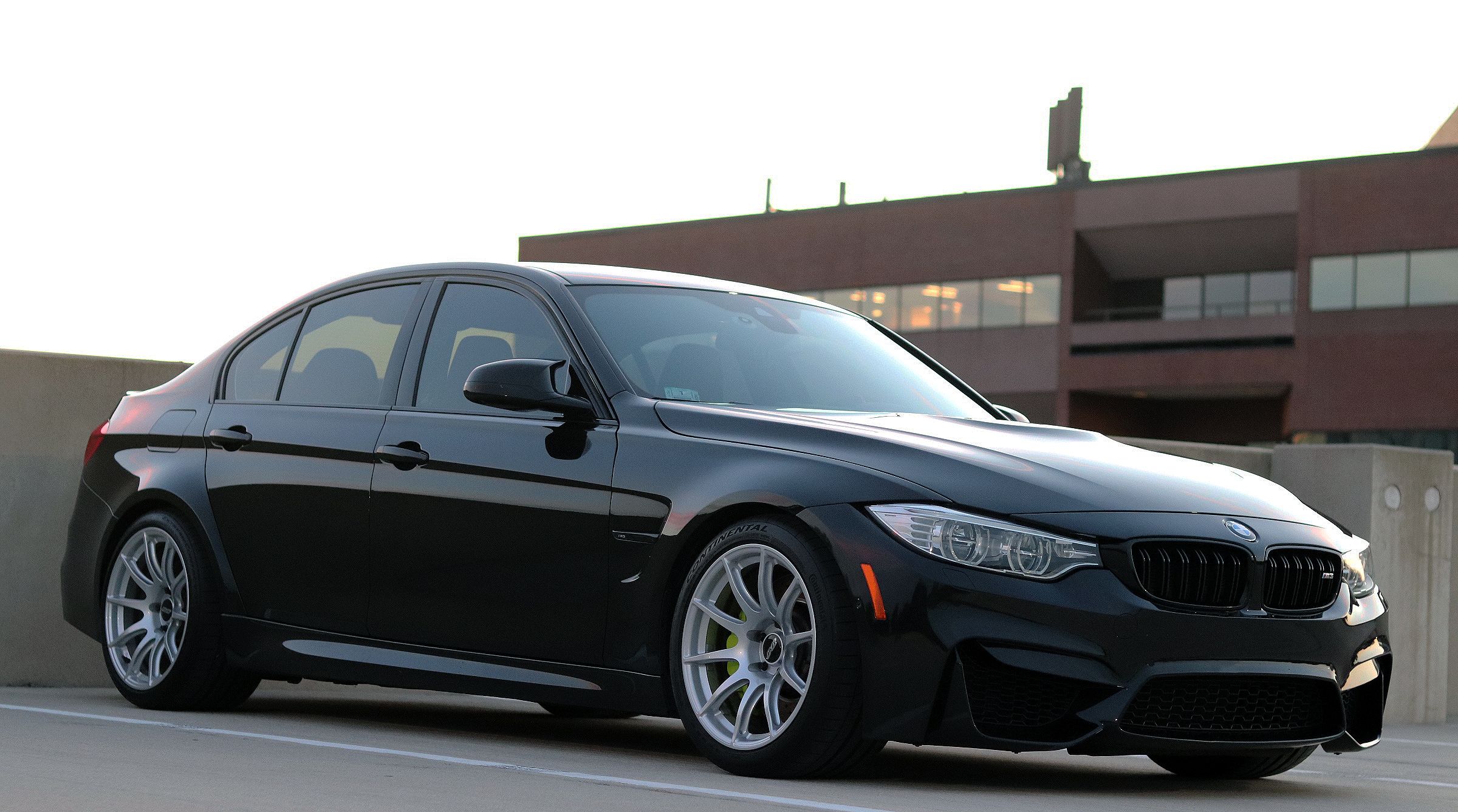 Black BMW F80 M3 with 18" SM-10 Apex wheels in Race Silver