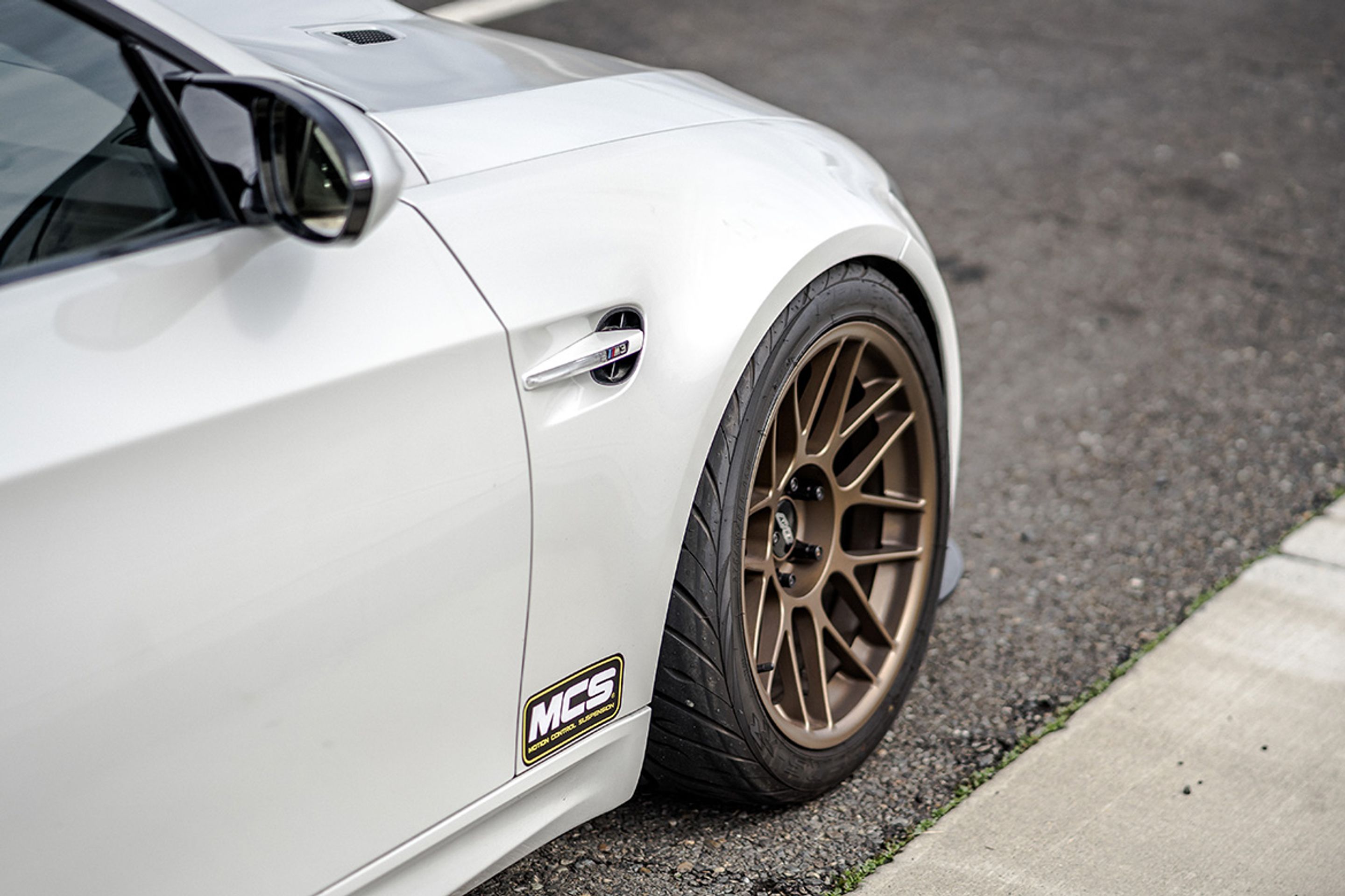 White BMW E92 Coupe M3 with 18" ARC-8 Apex wheels in Satin Bronze