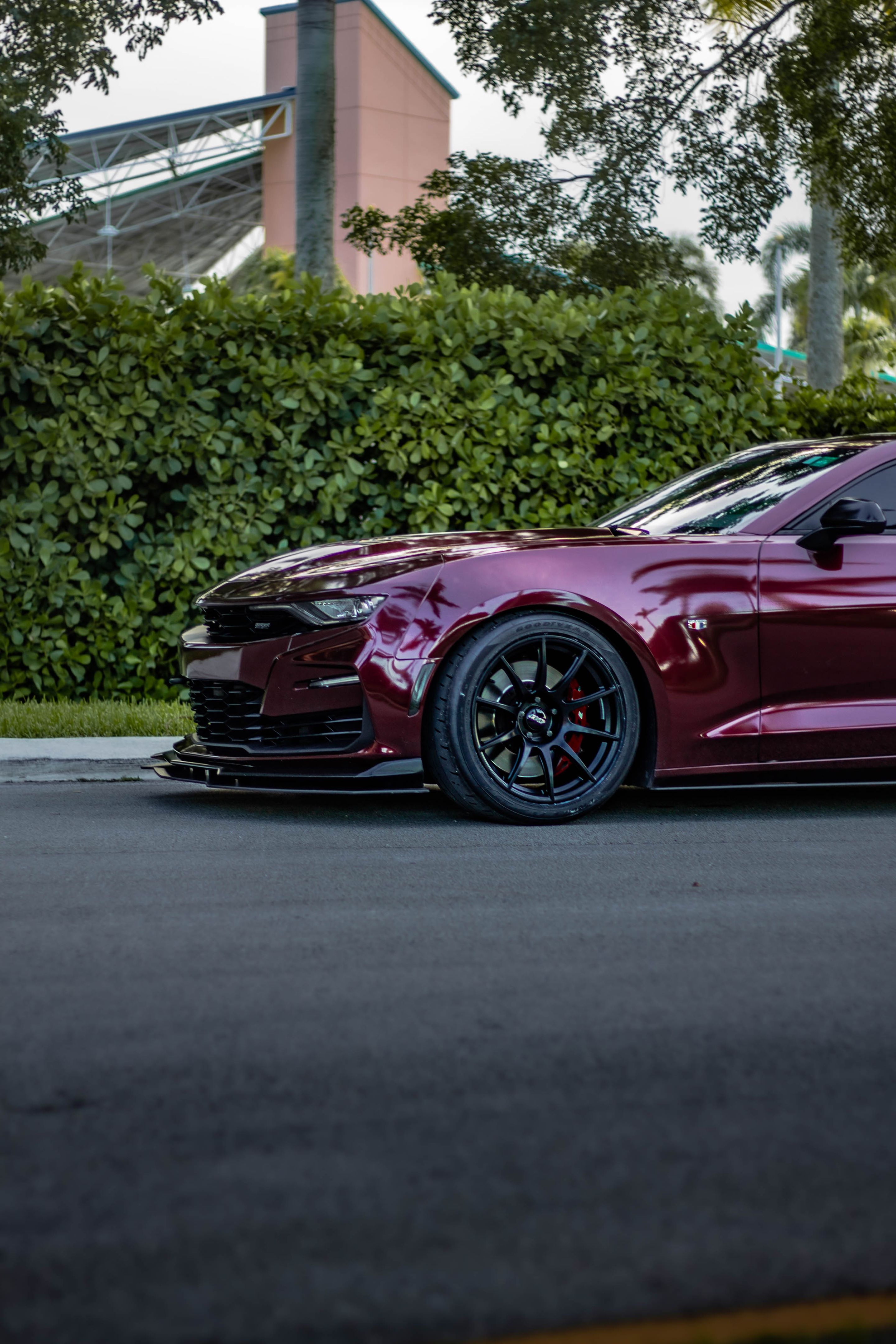 Red Chevrolet 6th Gen Camaro SS with 19" SM-10 Apex wheels in Satin Black