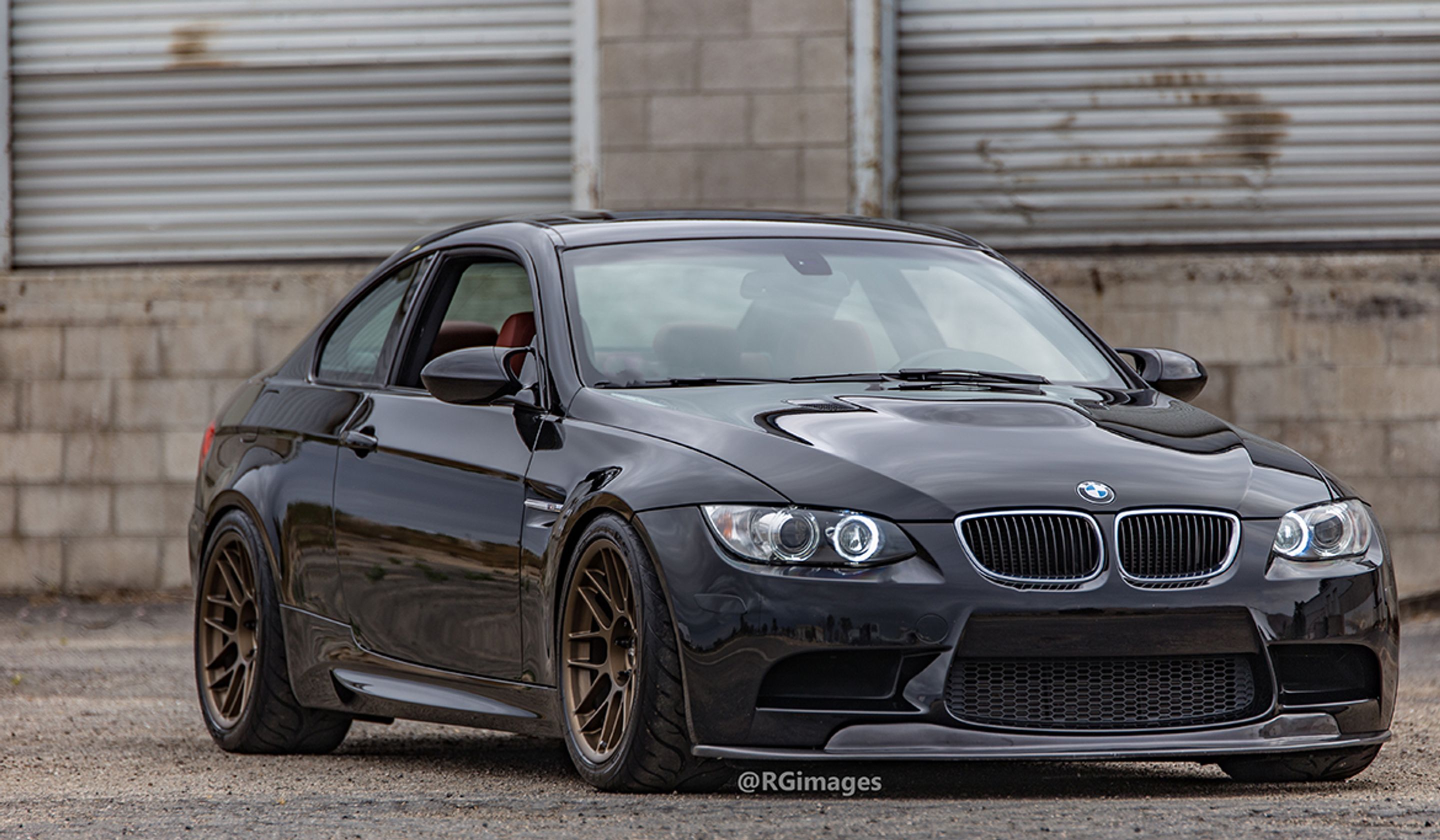 Black BMW E92 Coupe M3 with 18" ARC-8 Apex wheels in Satin Bronze