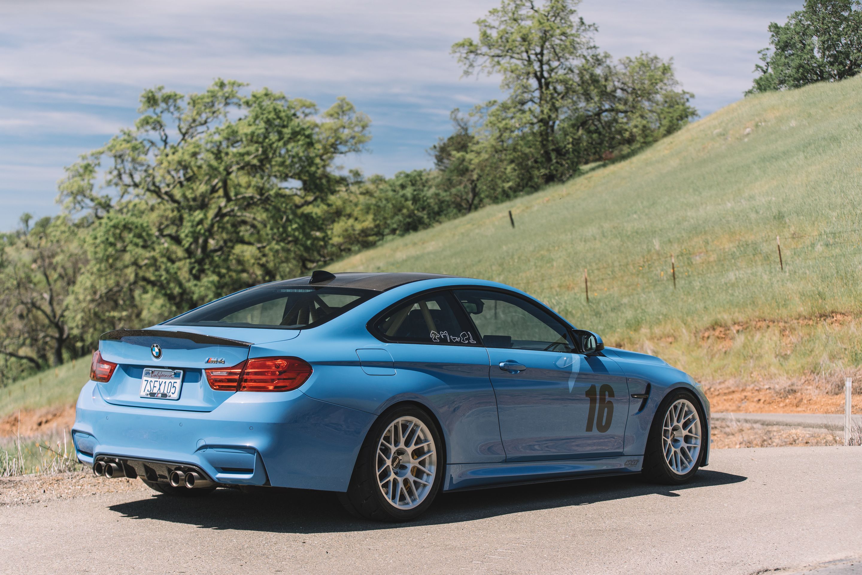 Blue BMW F82 Coupe M4 with 18" ARC-8R Apex wheels in Brushed Clear