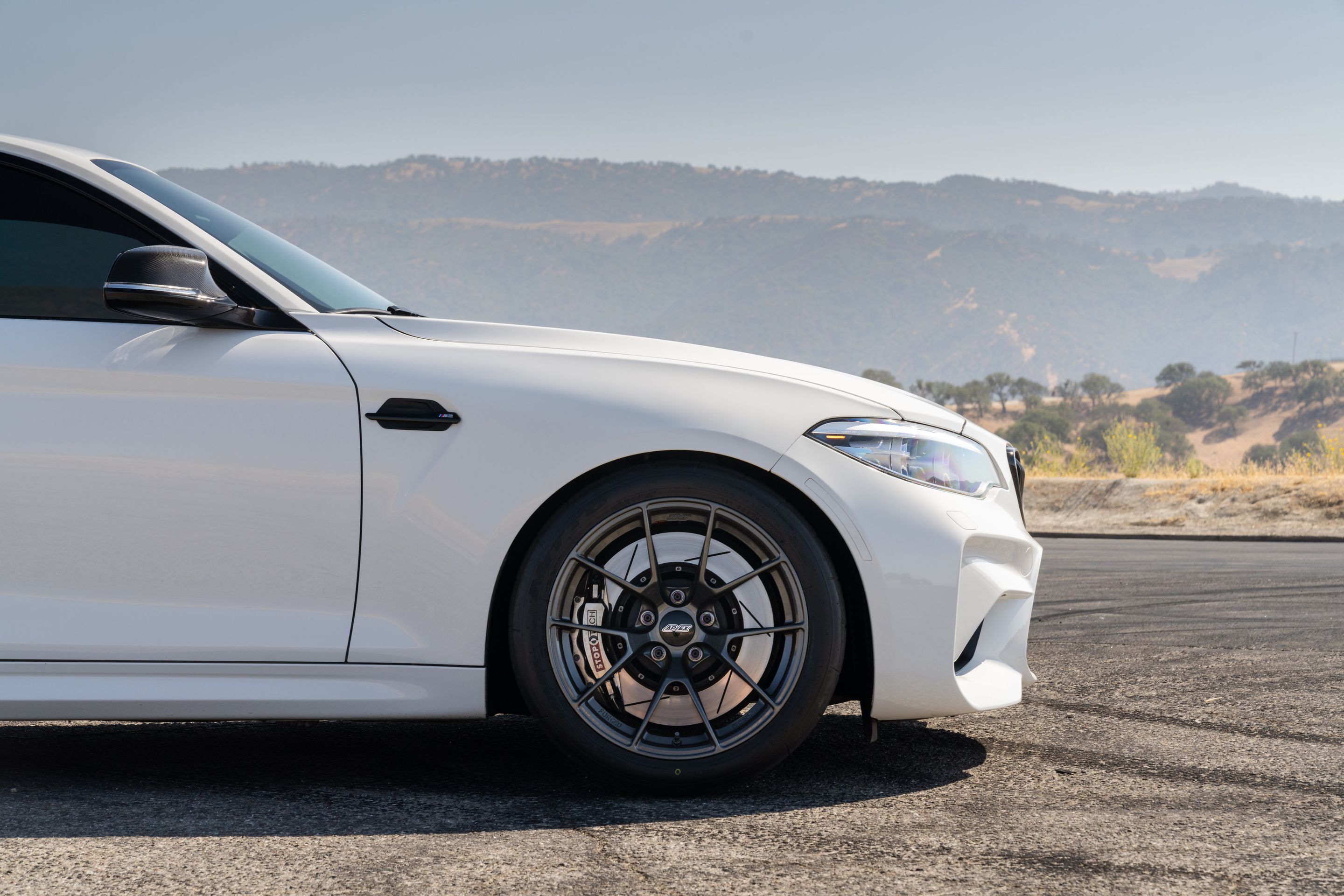 White BMW F87 M2 with 18" VS-5RS Apex wheels in Anthracite