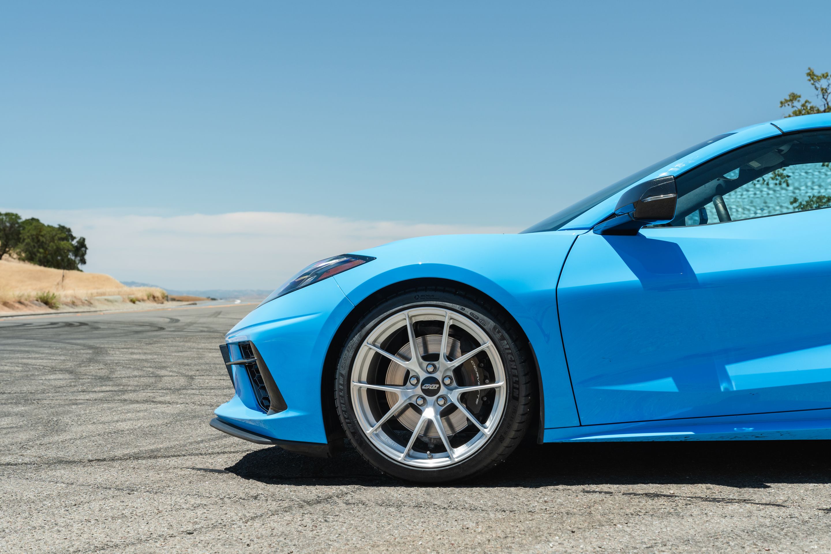 Blue Chevrolet C8 Corvette Stingray/Z51 with 19" VS-5RS Apex wheels in Brushed Clear