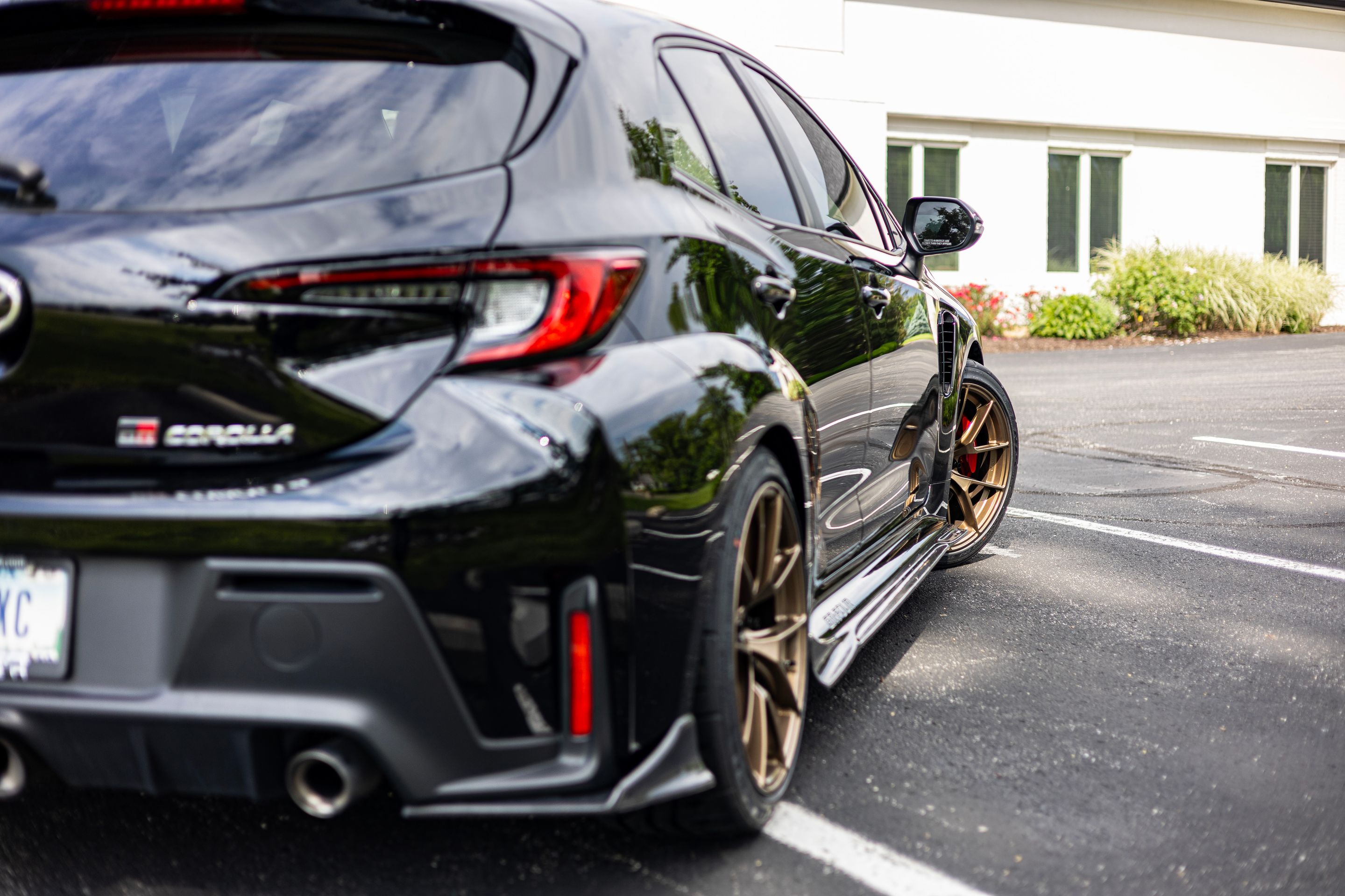 Black Toyota GR Corolla with 18" VS-5RS Apex wheels in Satin Bronze