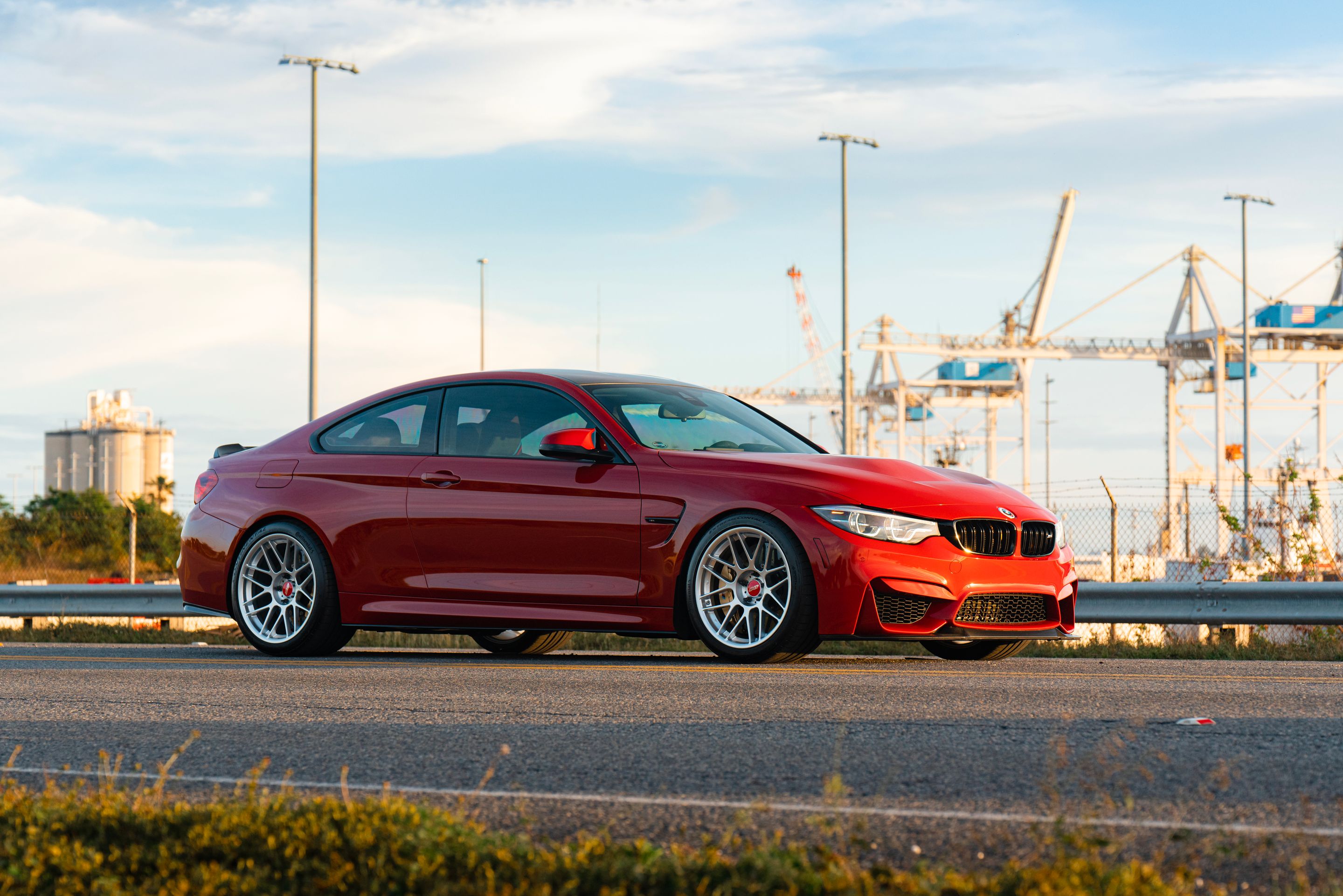 Red BMW F82 Coupe M4 with 19" ARC-8 Apex wheels in Hyper Silver