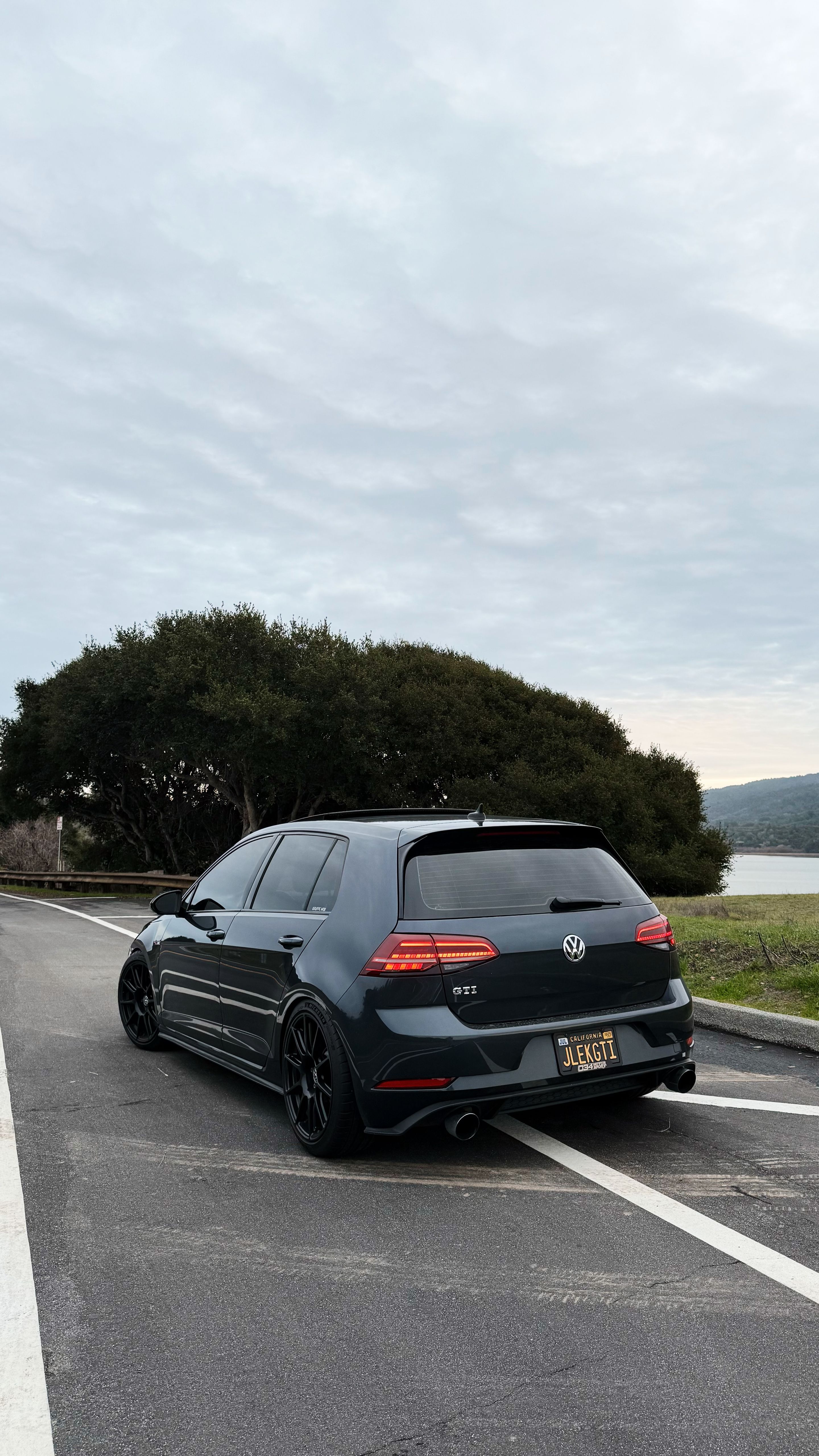 Grey VW MK7 GTI with 18" SM-10 Apex wheels in Satin Black
