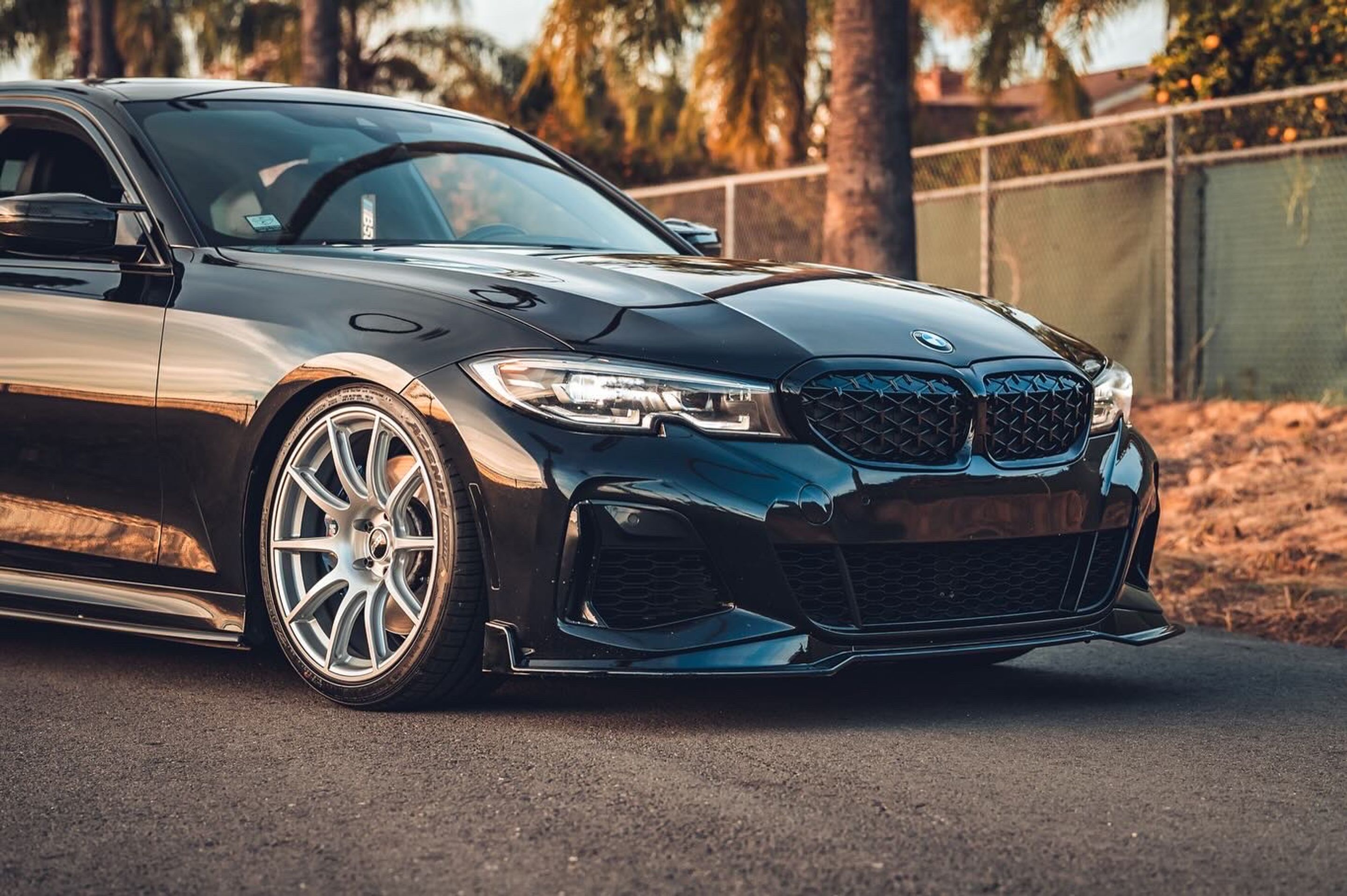 Black BMW G20 Sedan 3 Series with 19" SM-10 Apex wheels in Race Silver
