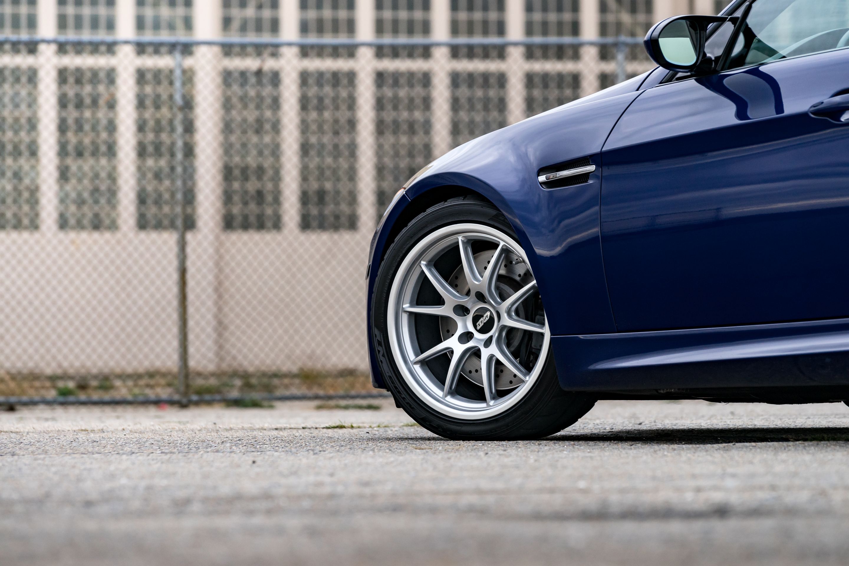 Blue BMW E90 Sedan M3 with 18" FL-5 Apex wheels in Race Silver