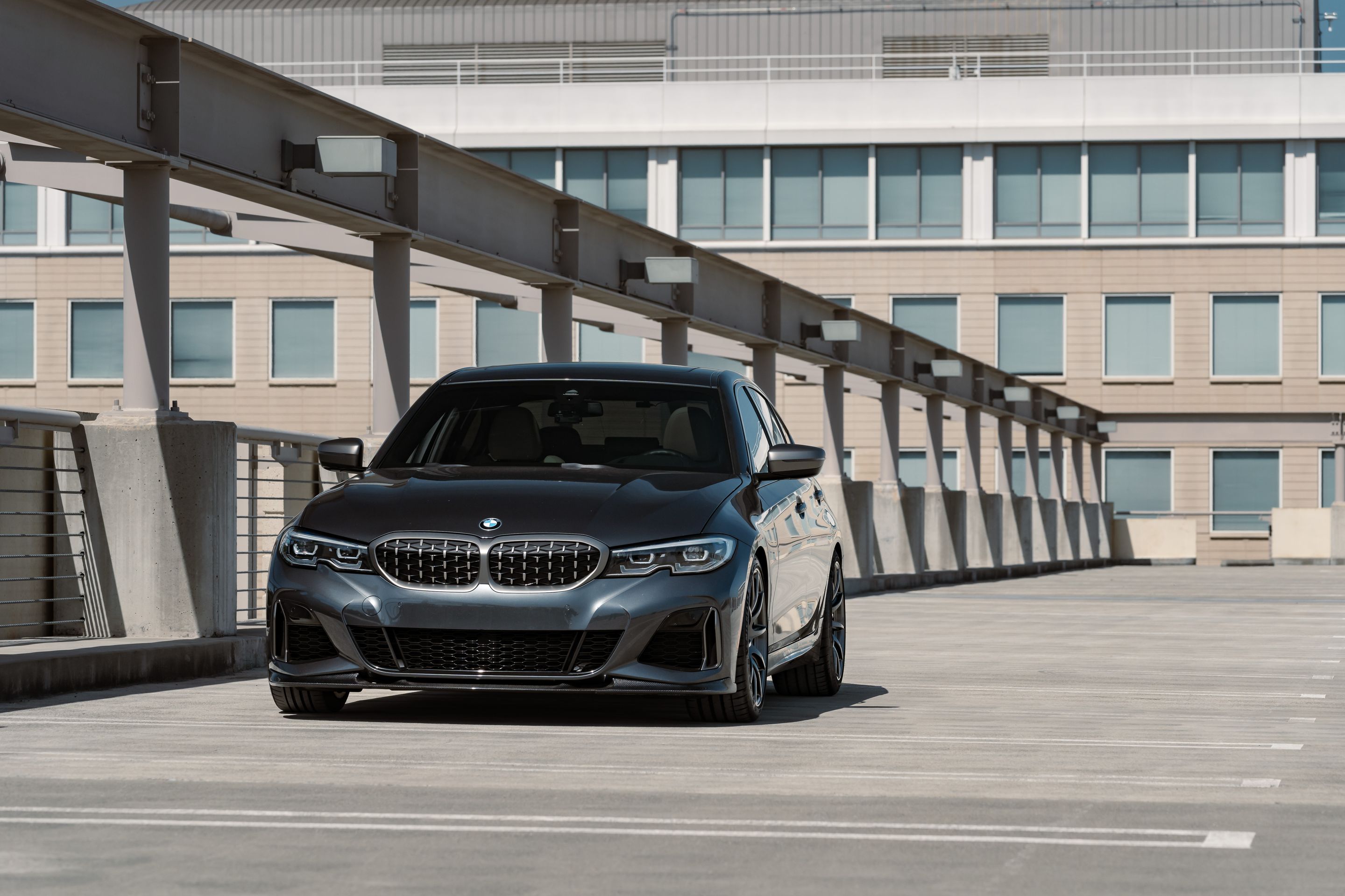 Grey BMW G20 Sedan 3 Series with 19" SM-10 Apex wheels in Anthracite