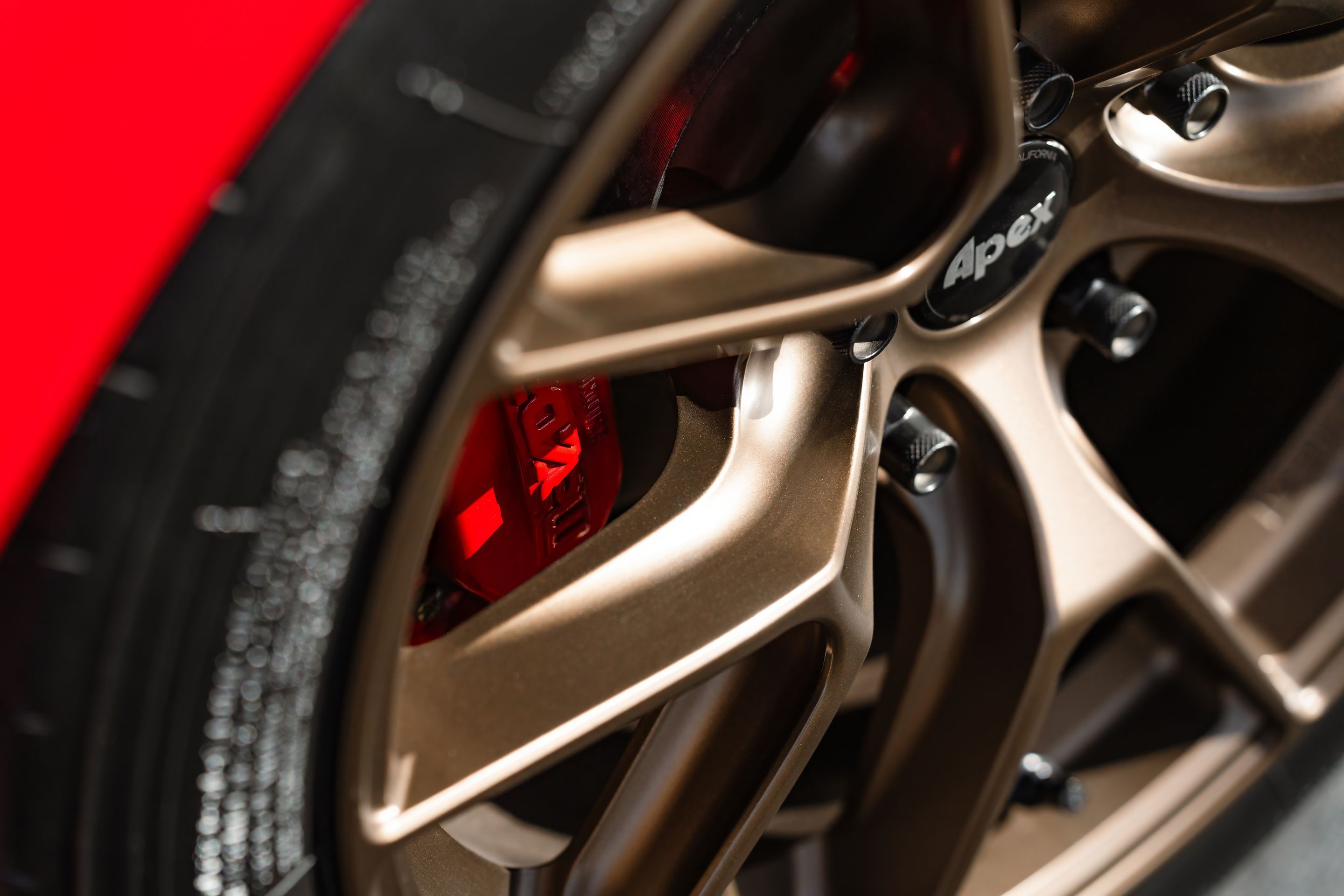 Red Mazda FD RX-7 with 17" VS-5RS Apex wheels in Satin Bronze