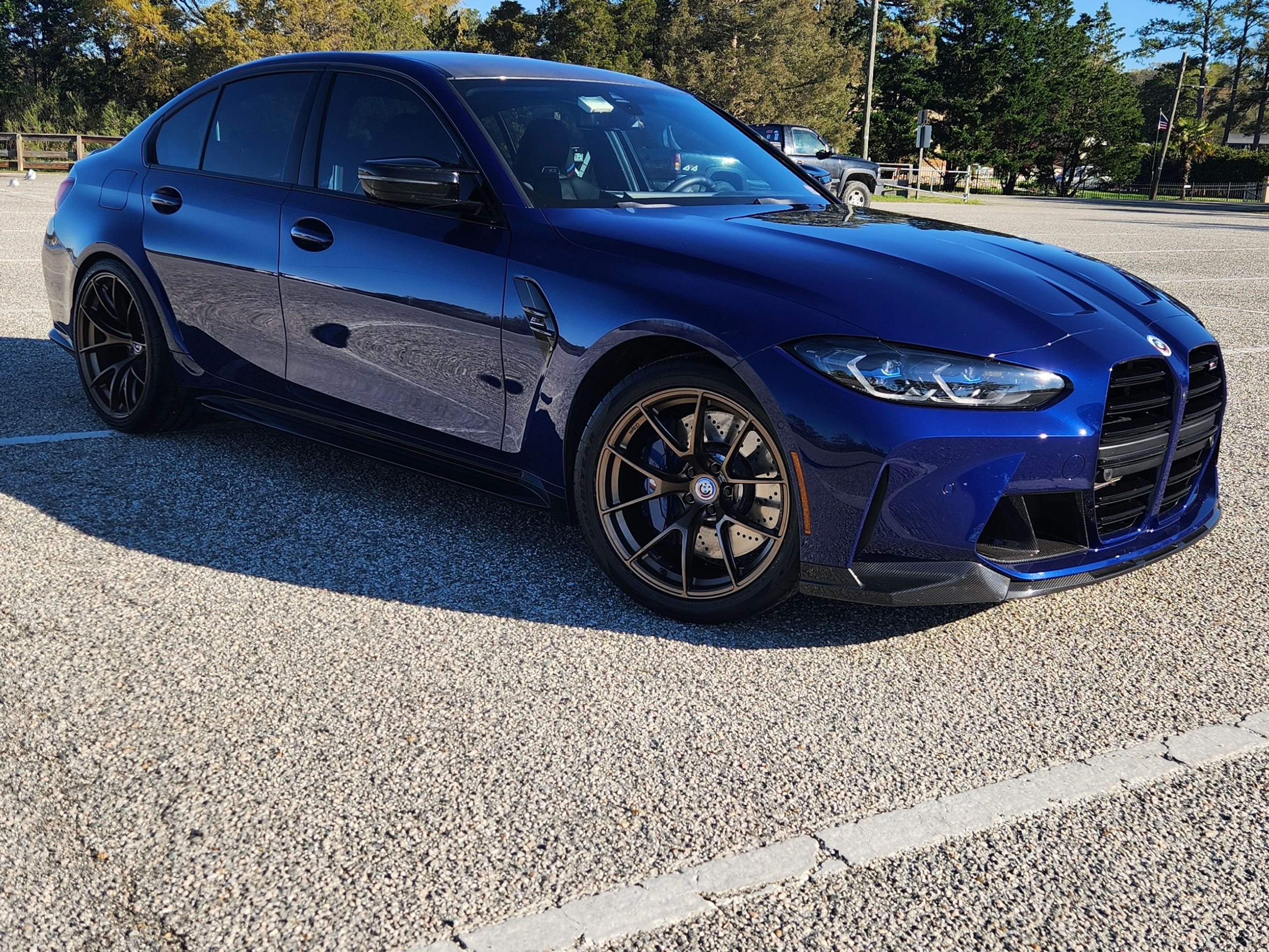 Blue BMW G80 M3 with 19"/20" VS-5RS Apex wheels in Satin Bronze