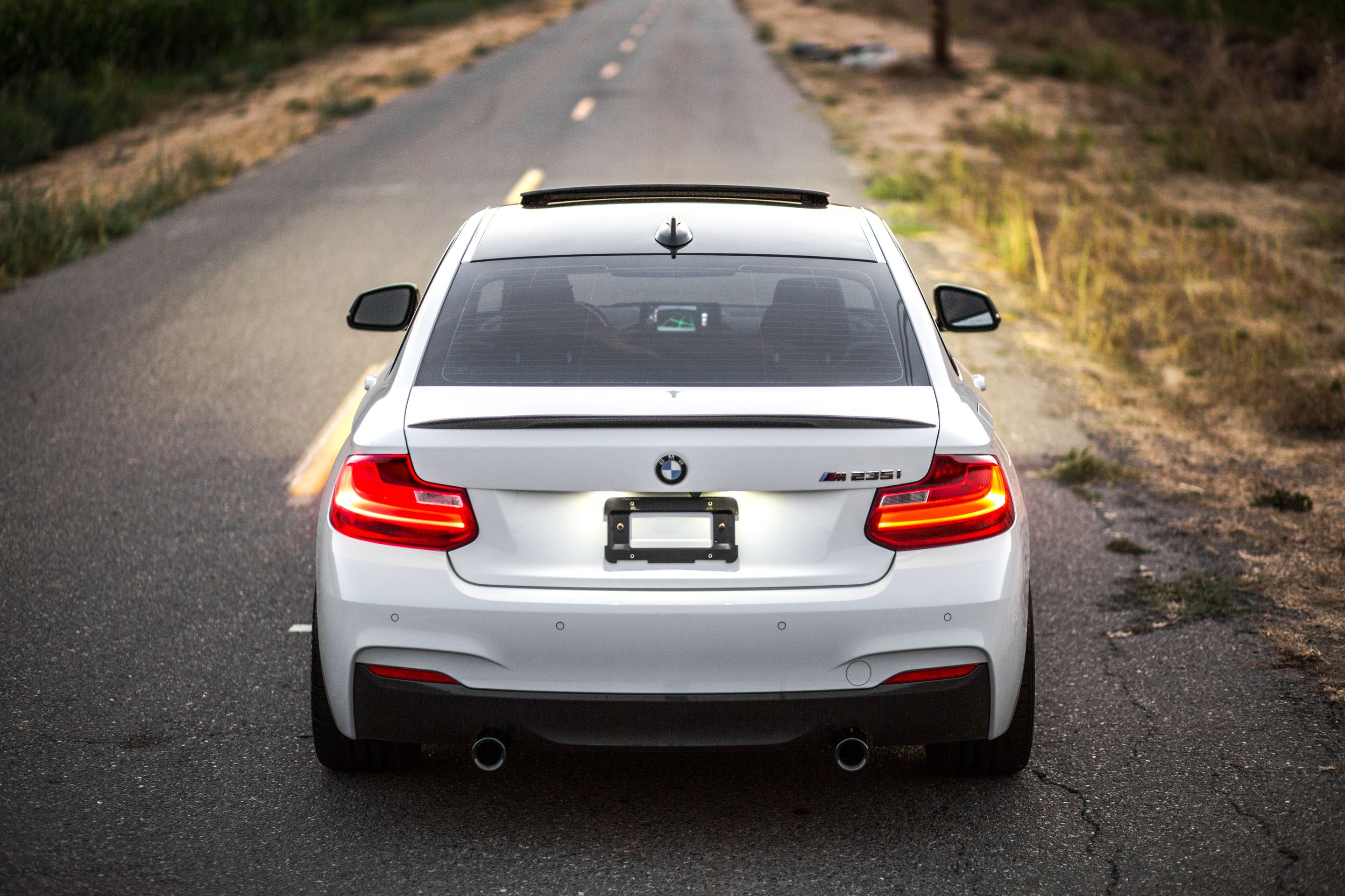 White BMW F22 Coupe 2 Series with 18" ARC-8 Apex wheels in Satin Bronze