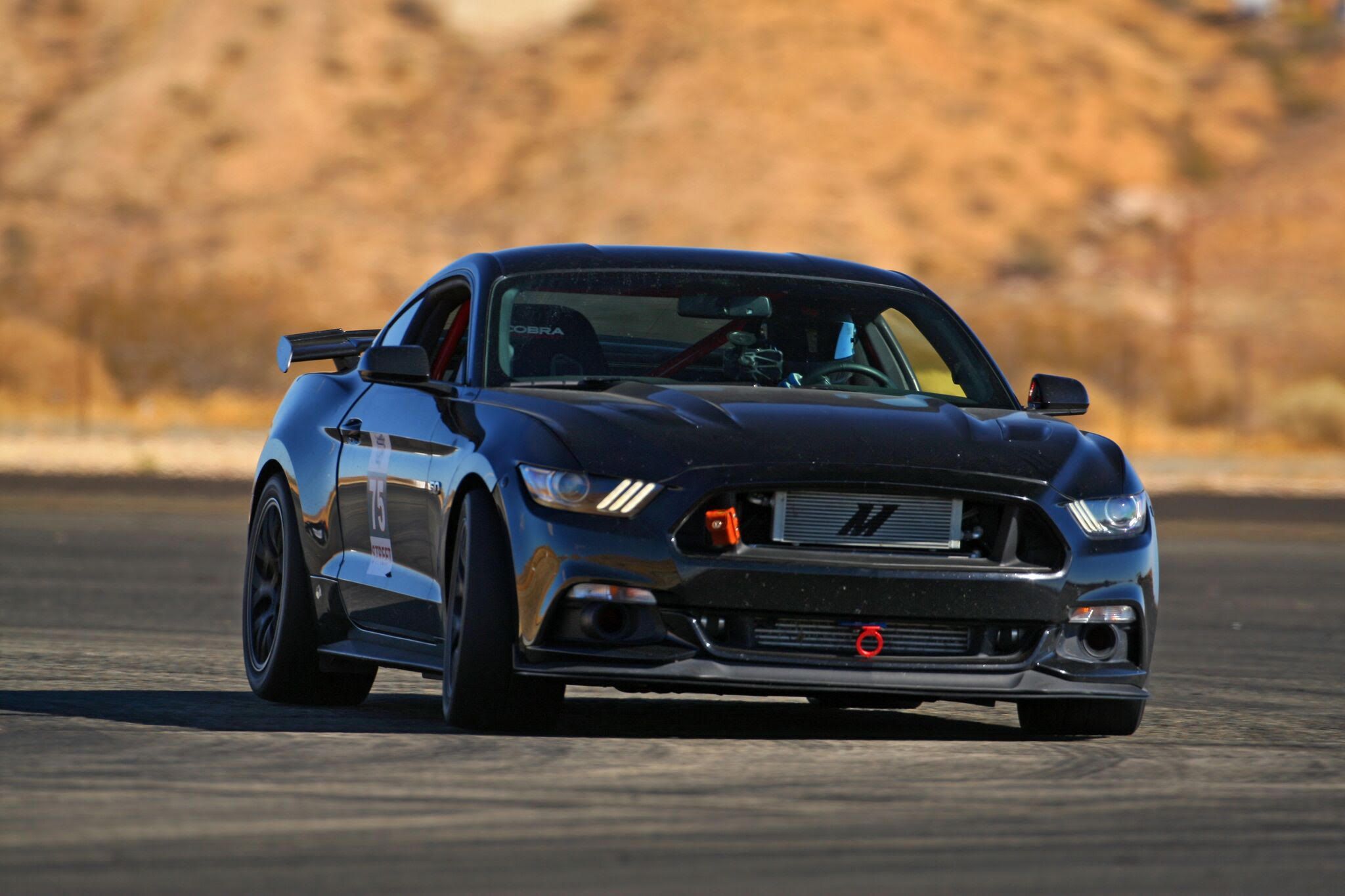 Black Ford S550 Mustang GT with 18" EC-7 Apex wheels in Satin Black