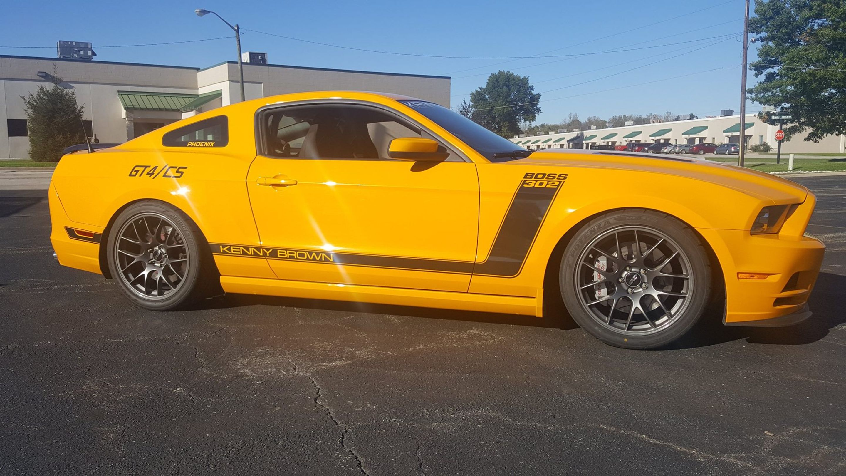 Yellow Ford S197 Mustang Boss 302 with 19" EC-7 Apex wheels in Anthracite