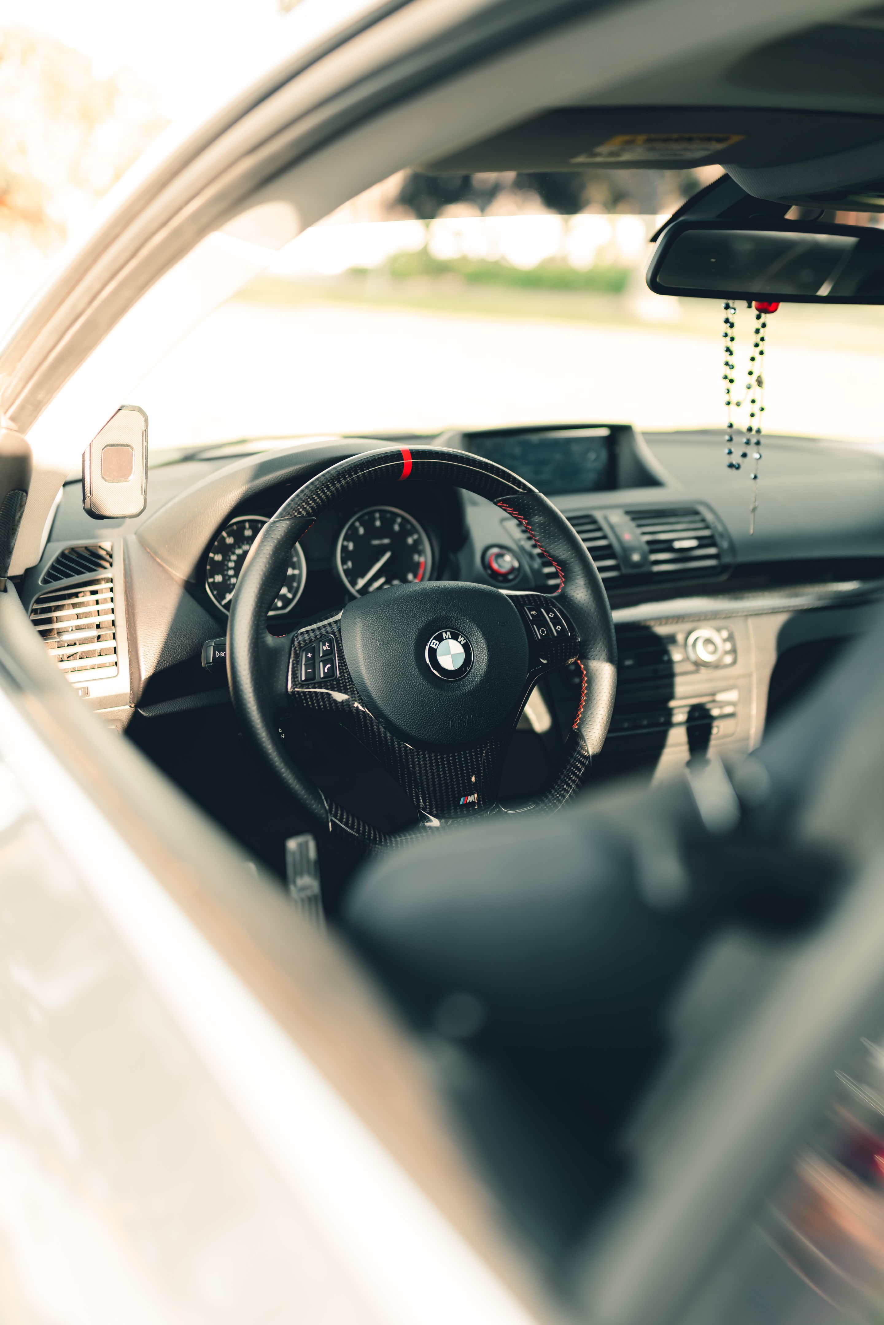 Grey BMW E82 Coupe 1 Series with 18" EC-7 Apex wheels in Race Silver