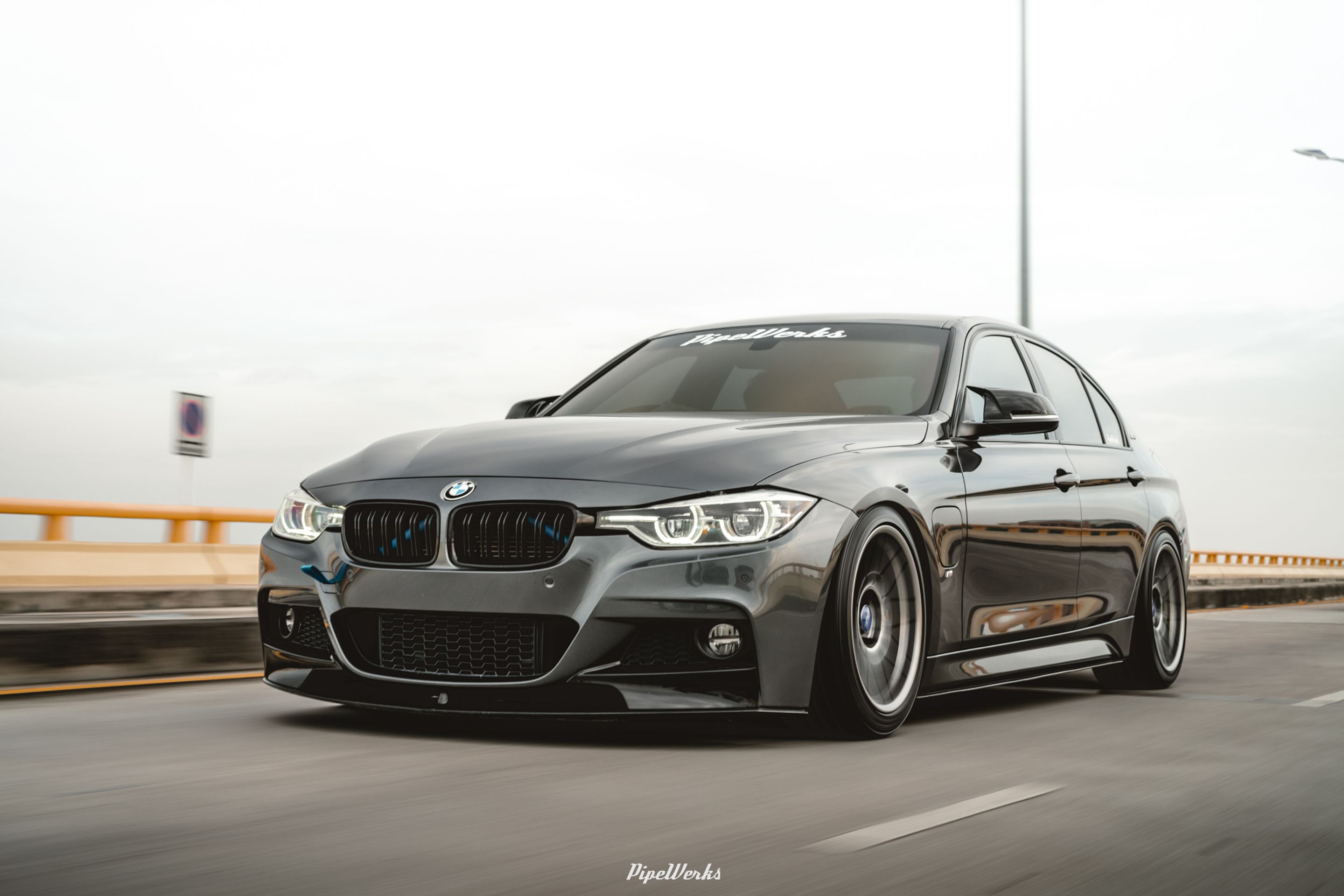 Grey BMW F30 Sedan 3 Series with 18" ARC-8 Apex wheels in Hyper Black