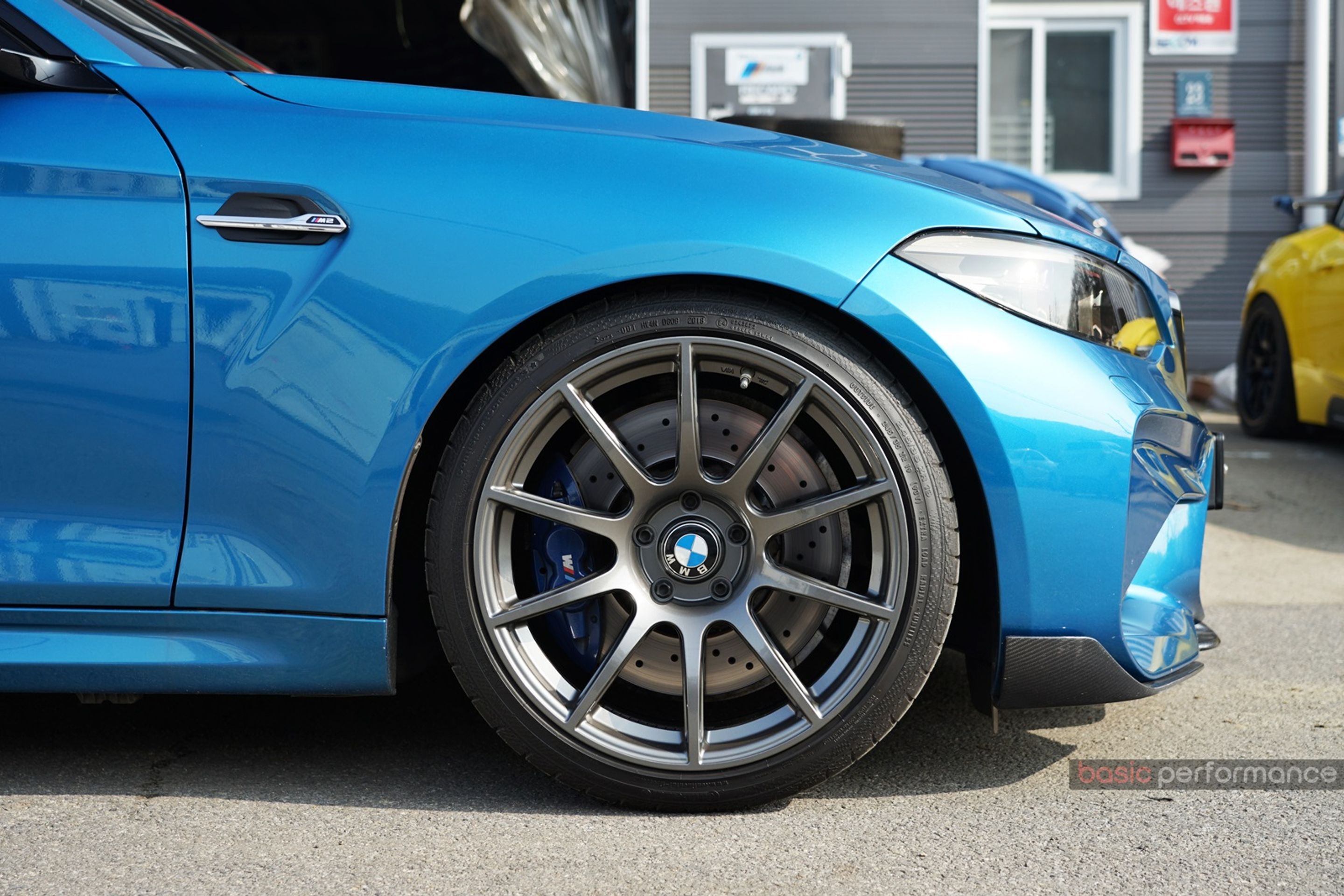 Blue BMW F87 M2 with 19" SM-10 Apex wheels in Anthracite