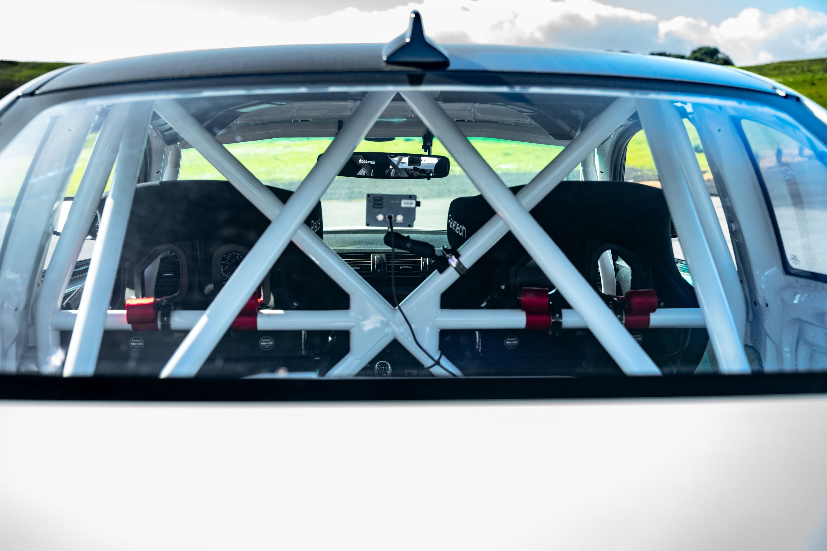 White BMW E82 1M with 18" VS-5 Apex wheels in Race Silver